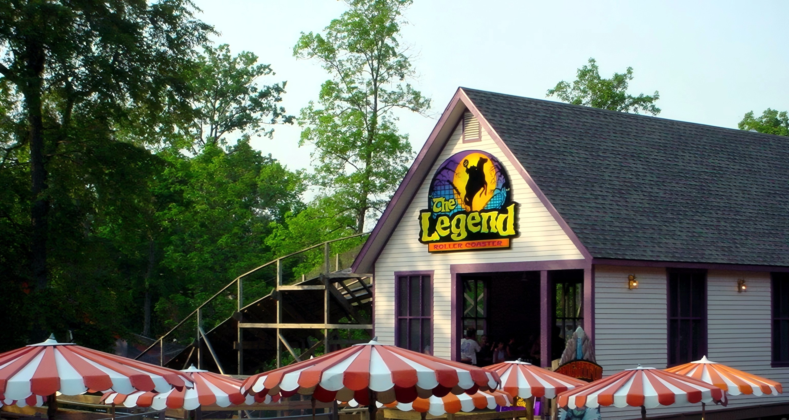 The Legend's station house above the striped picnic umbrellas, July 2002