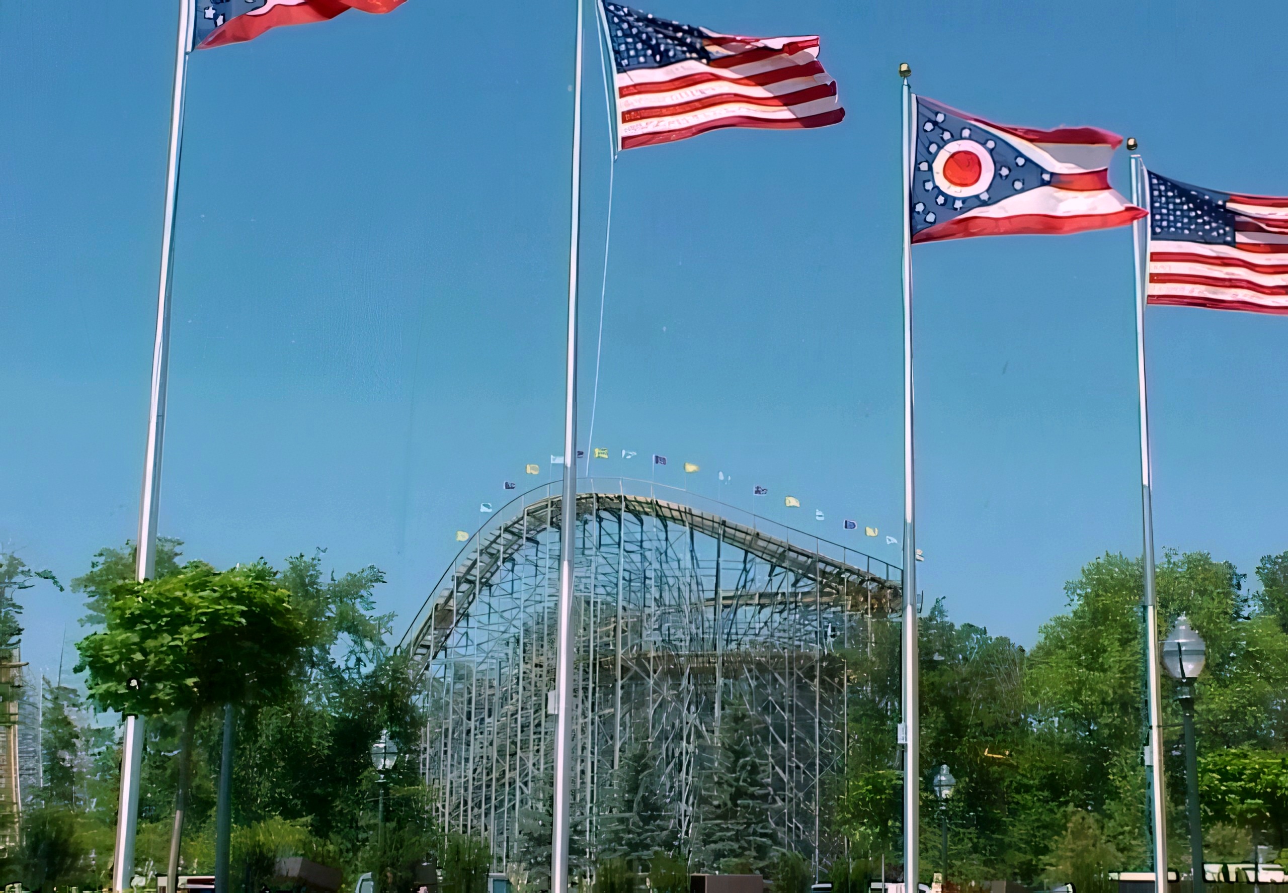 Ohio and American flags with The Villain behind at Geauga Lake, May 2000