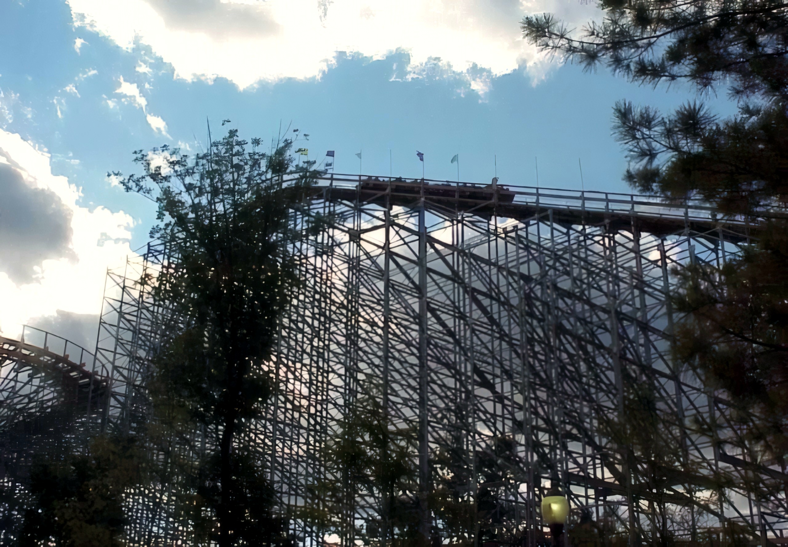 The Villain's structure under a dramatic sky at Geauga Lake, May 2000