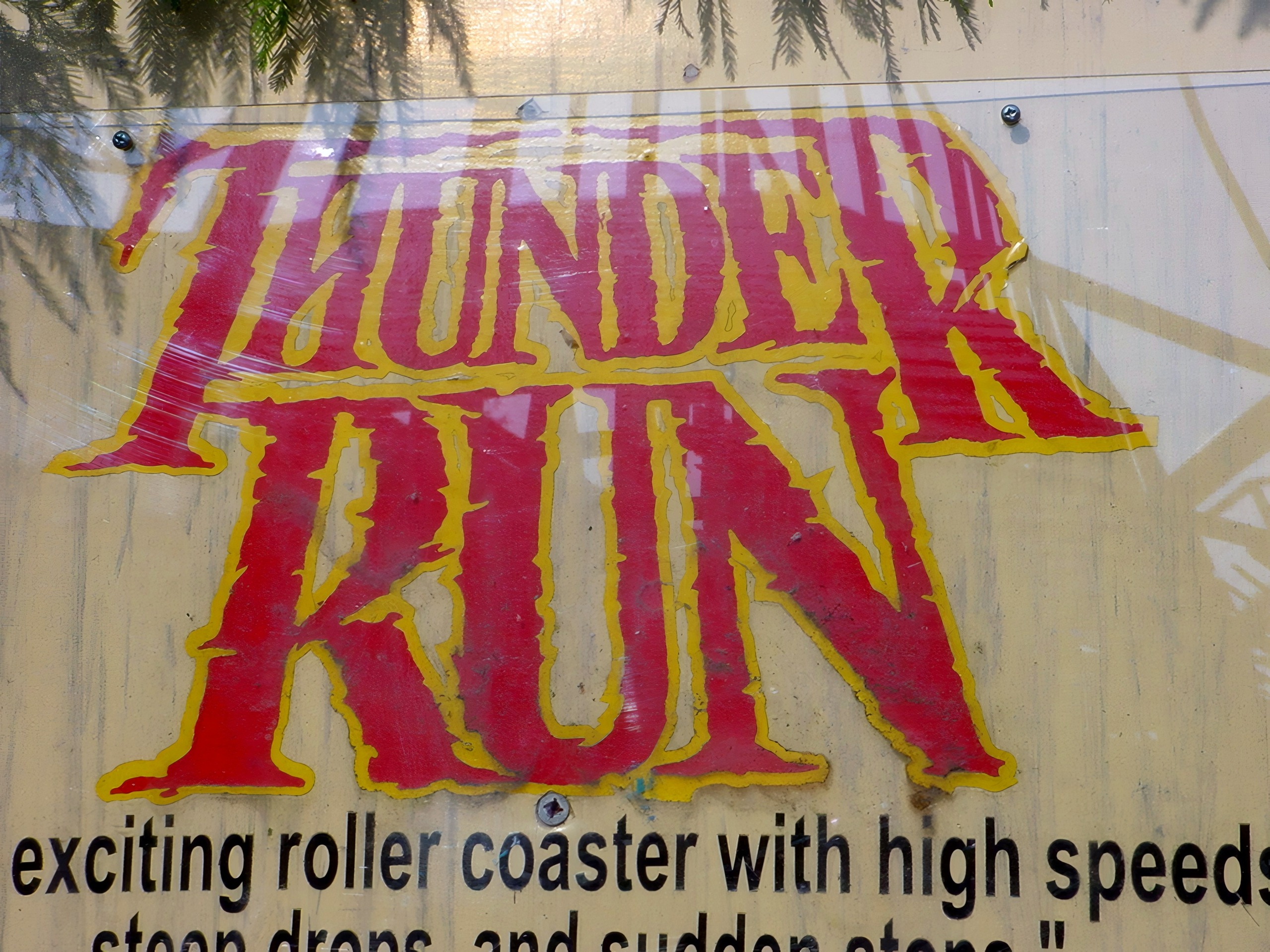 The Thunder Run sign promising high speeds and steep drops at Six Flags Kentucky Kingdom, July 2002