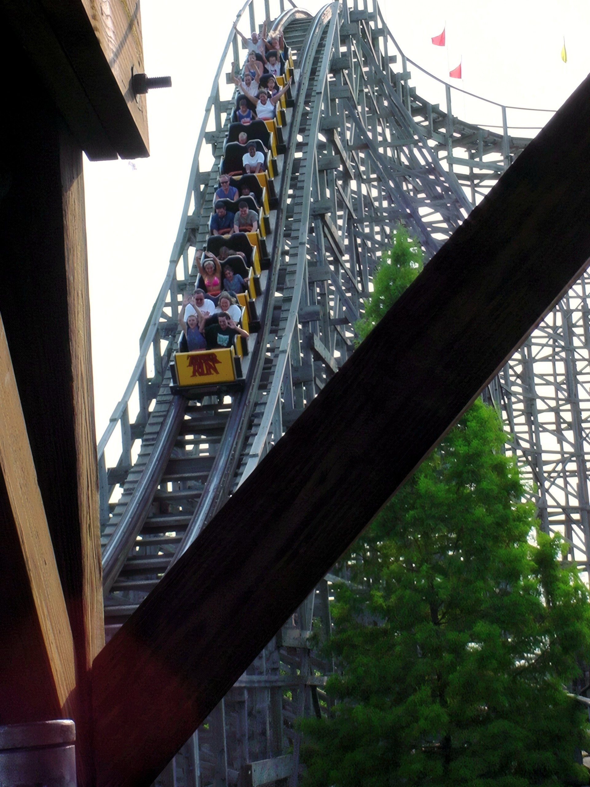 A Thunder Run train full of riders dropping down a hill at Six Flags Kentucky Kingdom, July 2002