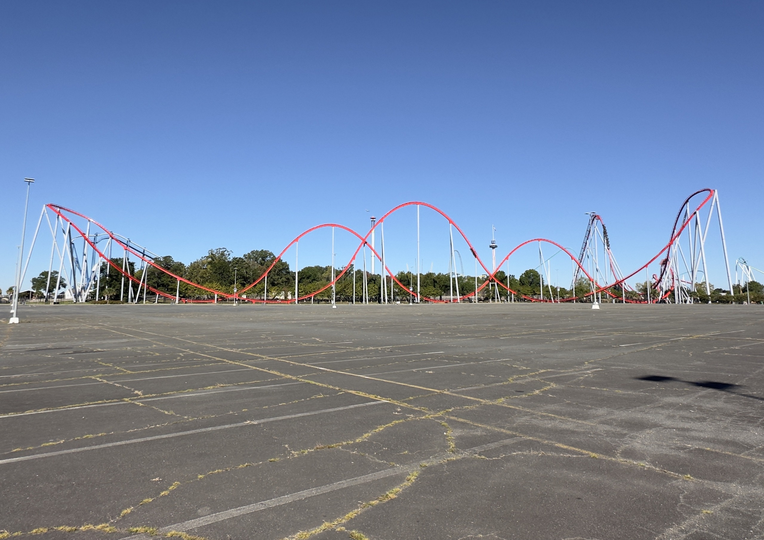 Thunder Striker's full red layout from the parking lot, Fury 325 at the right, Carowinds, October 2024