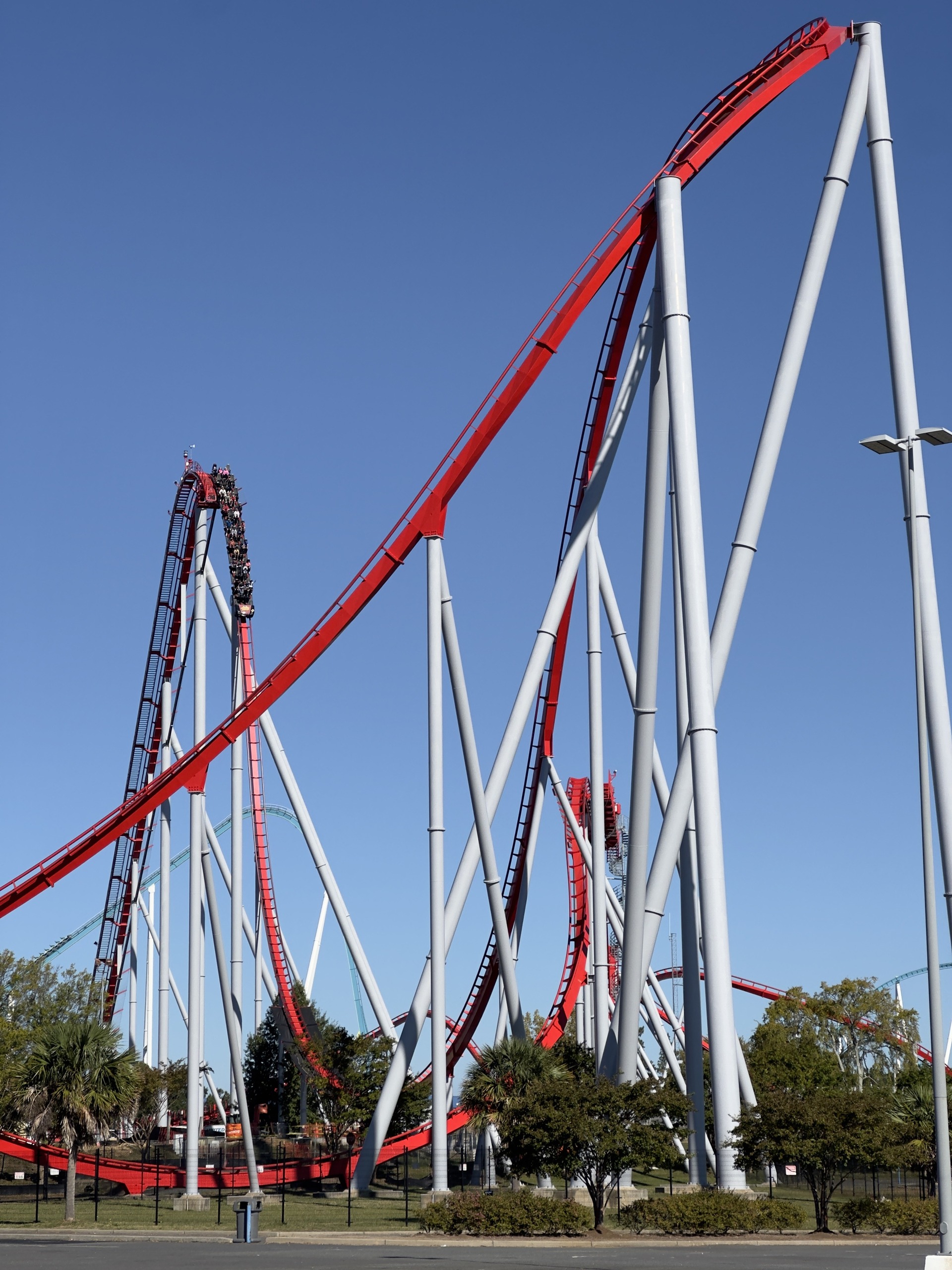 Thunder Striker's 232-foot lift hill and first drop from the parking lot, Carowinds, October 2024