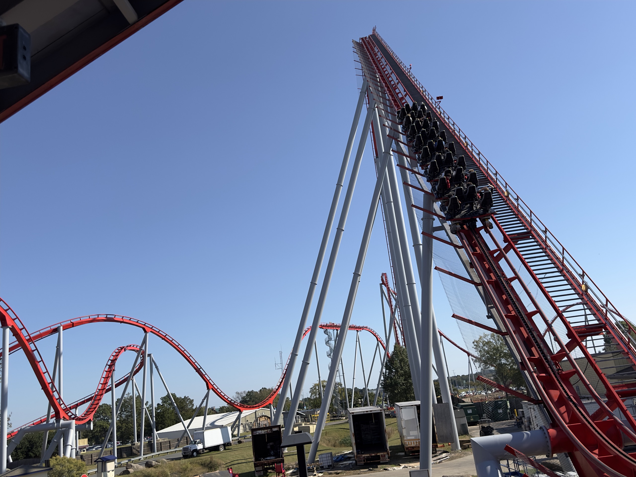 A Thunder Striker train high on the lift hill, Carowinds, October 2024