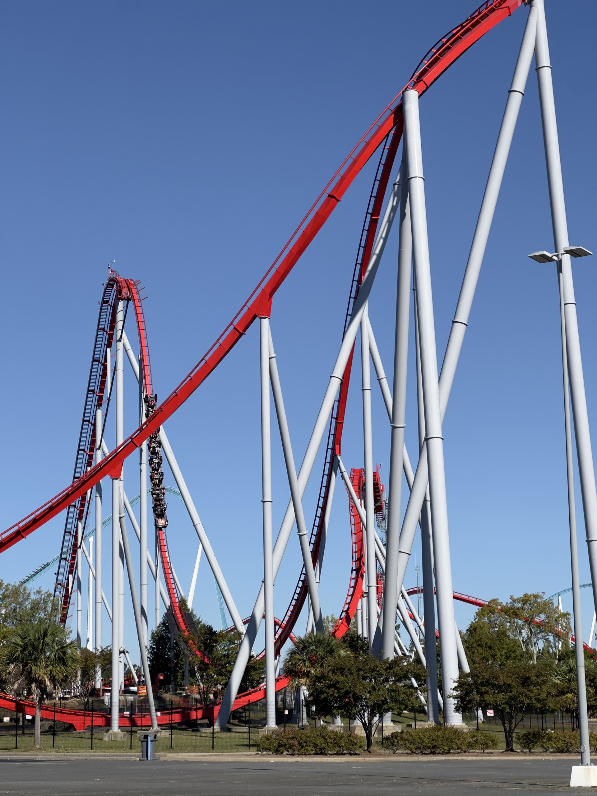 A Thunder Striker train on the 211-foot first drop, Carowinds, October 2024