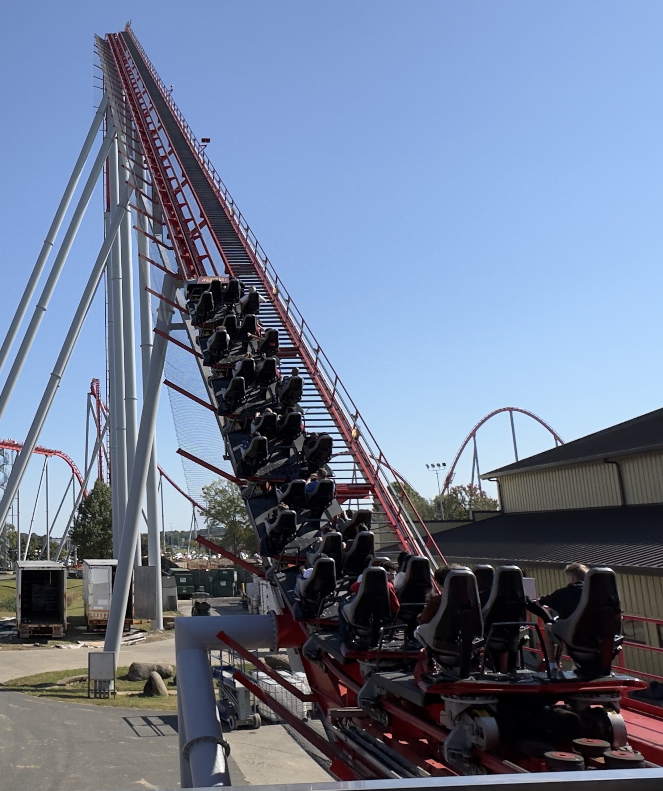 A Thunder Striker train starting up the red lift hill, Carowinds, October 2024