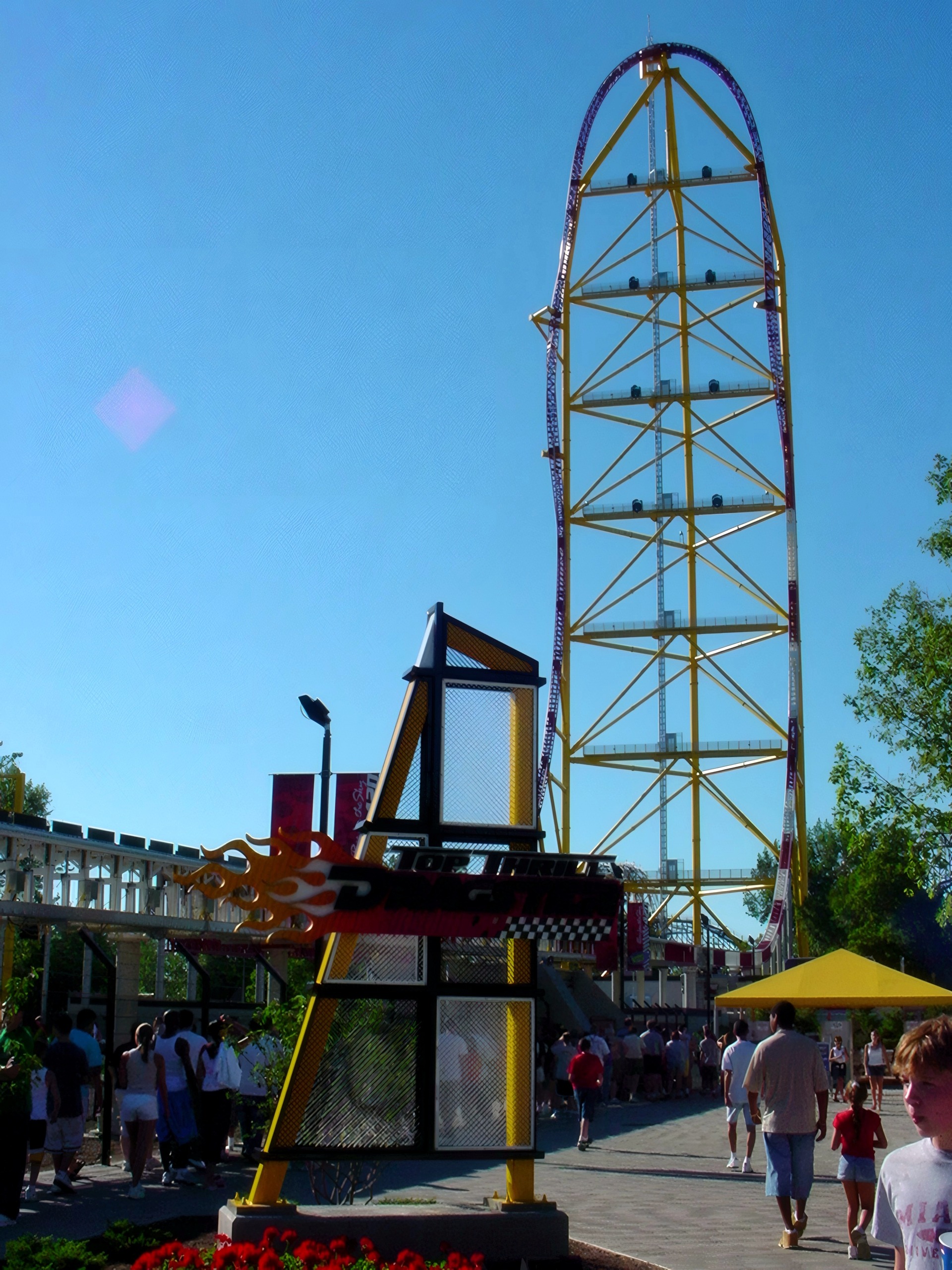 Tall coaster lift hill tower with midway below, Top Thrill Dragster, July 2003