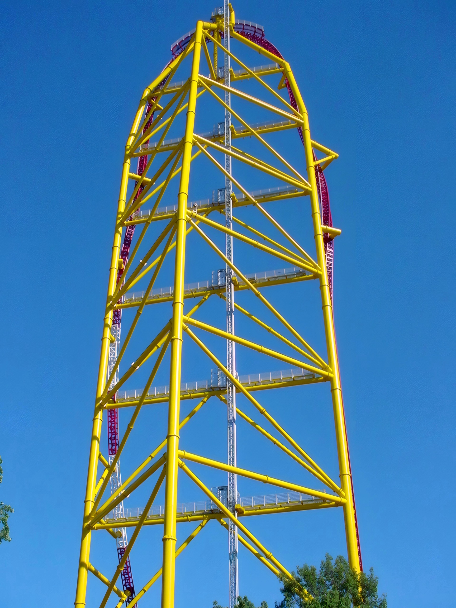 Tall yellow launch tower against blue sky, Top Thrill Dragster, July 2003