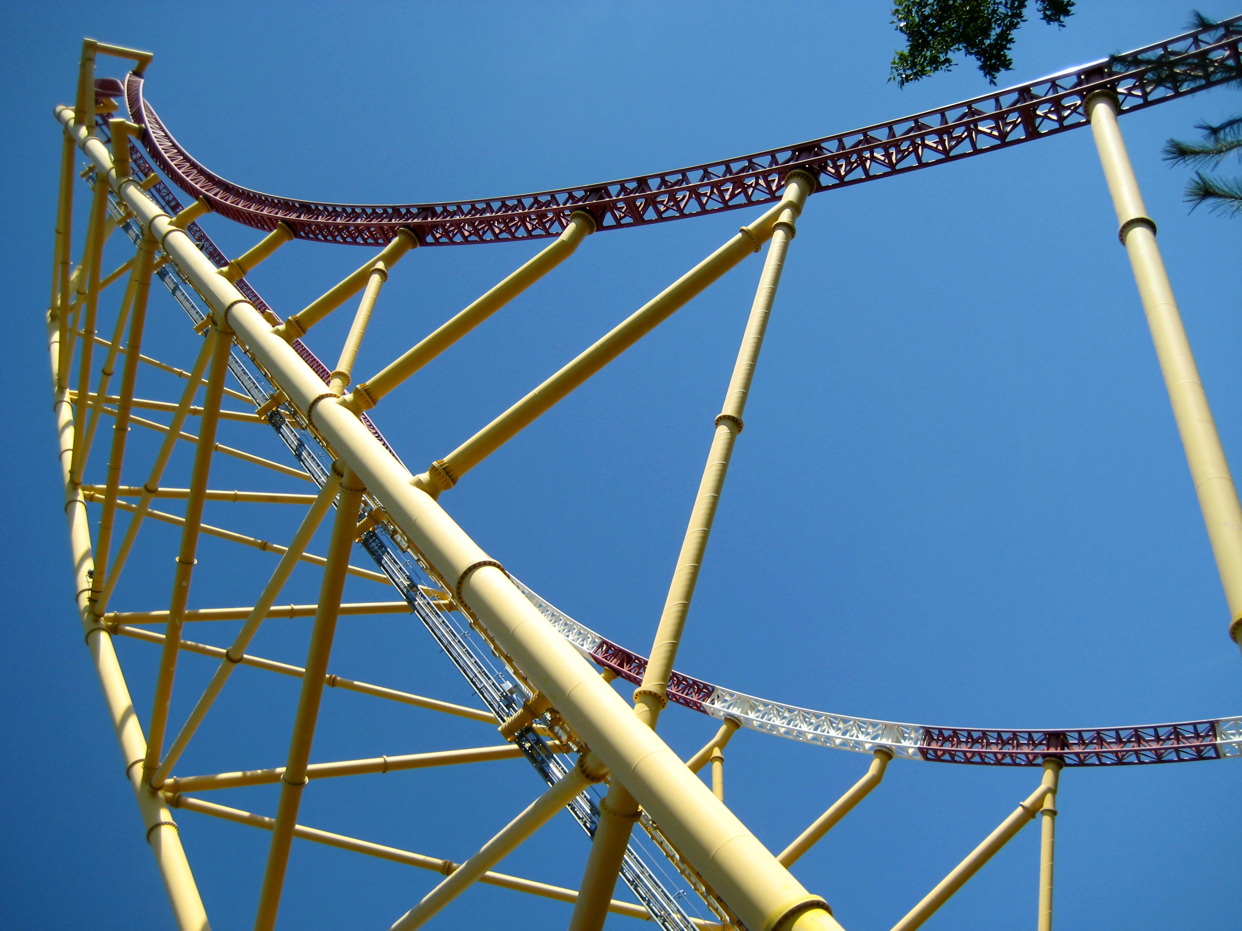 Yellow lift structure with red coaster track against blue sky, Top Thrill Dragster, September 2007