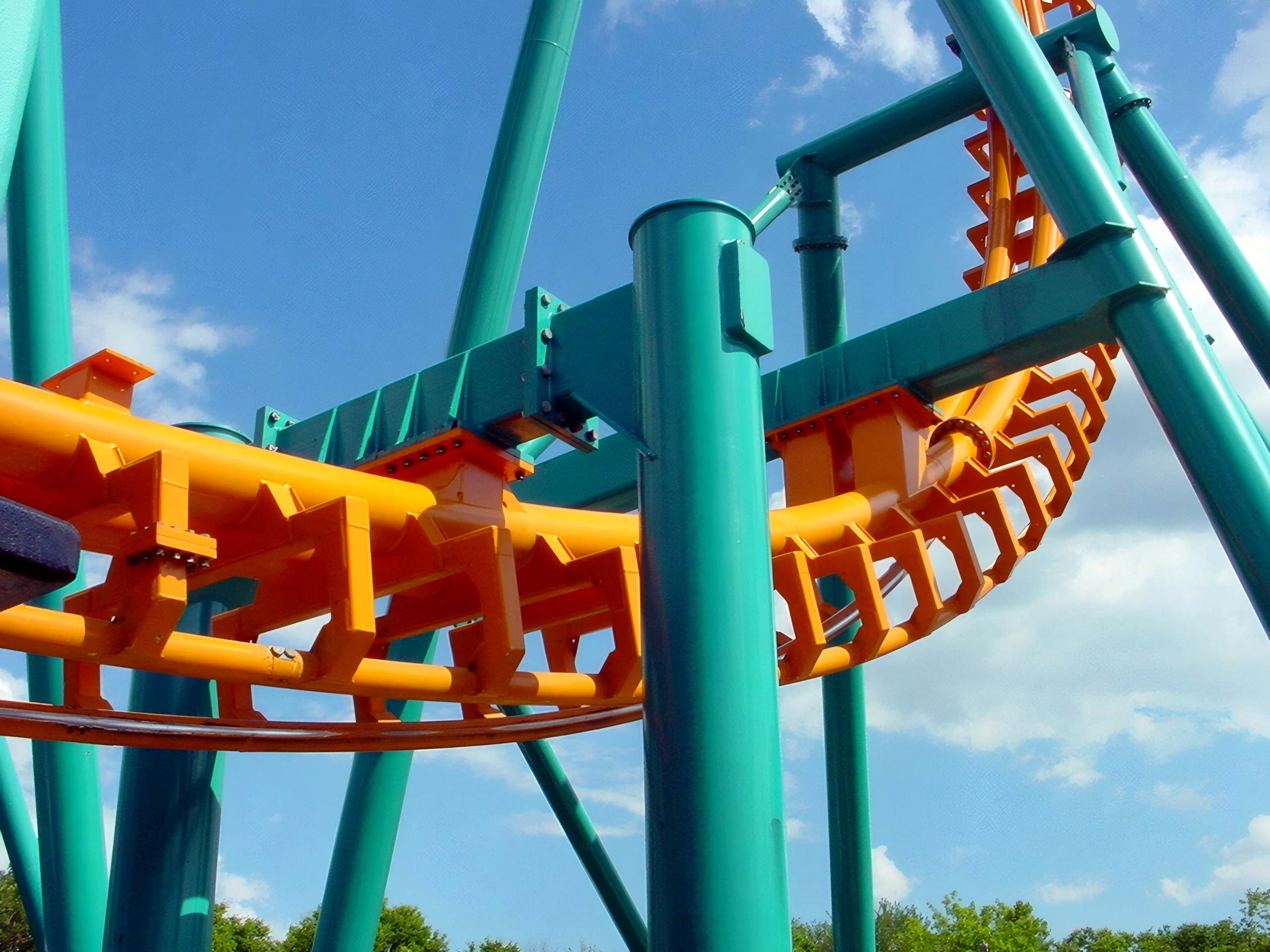 Two-Face: The Flip Side's orange track curving through the teal supports at Six Flags America, July 2001
