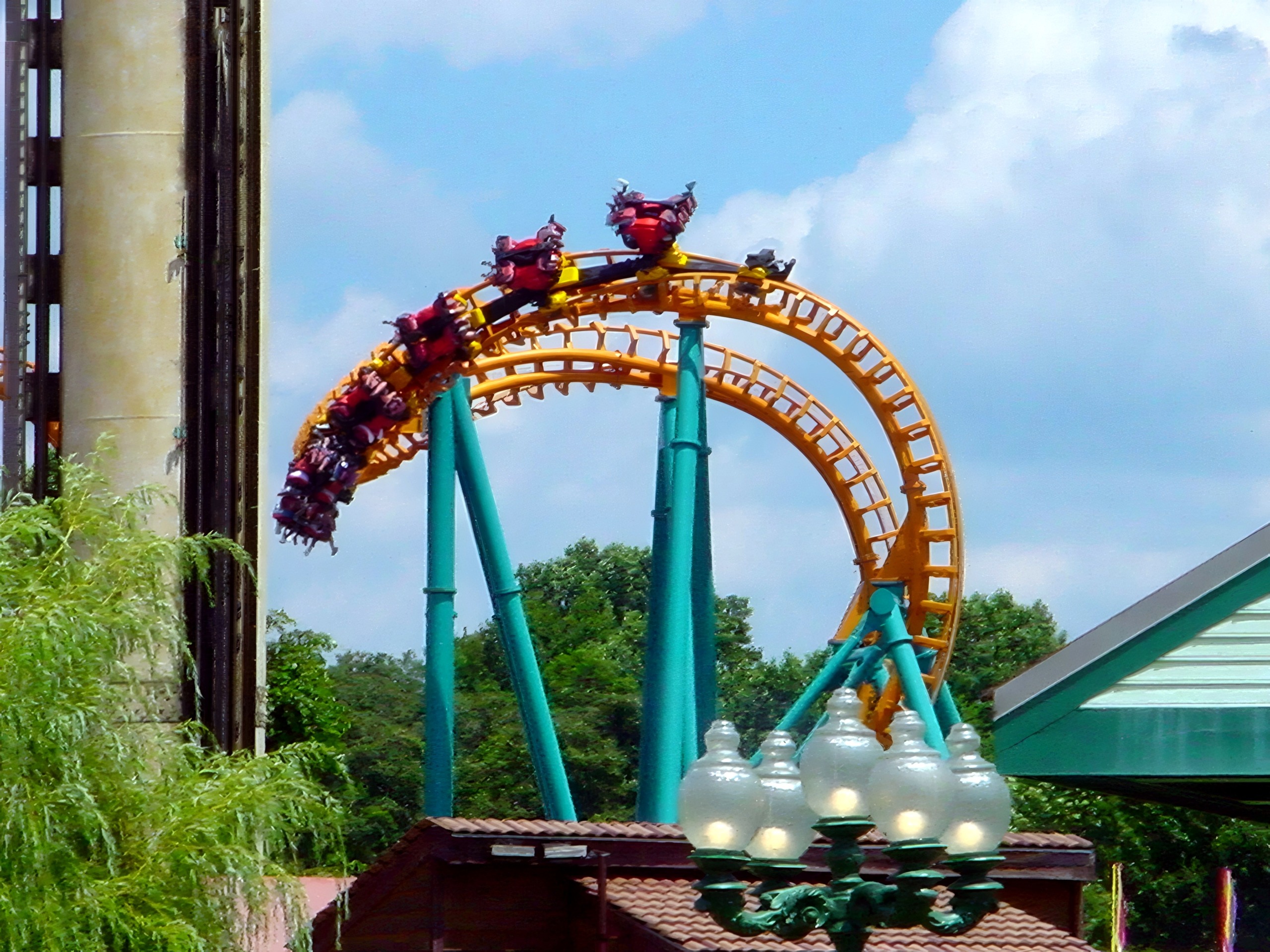 A Two-Face: The Flip Side train inverting through the cobra roll at Six Flags America, July 2001