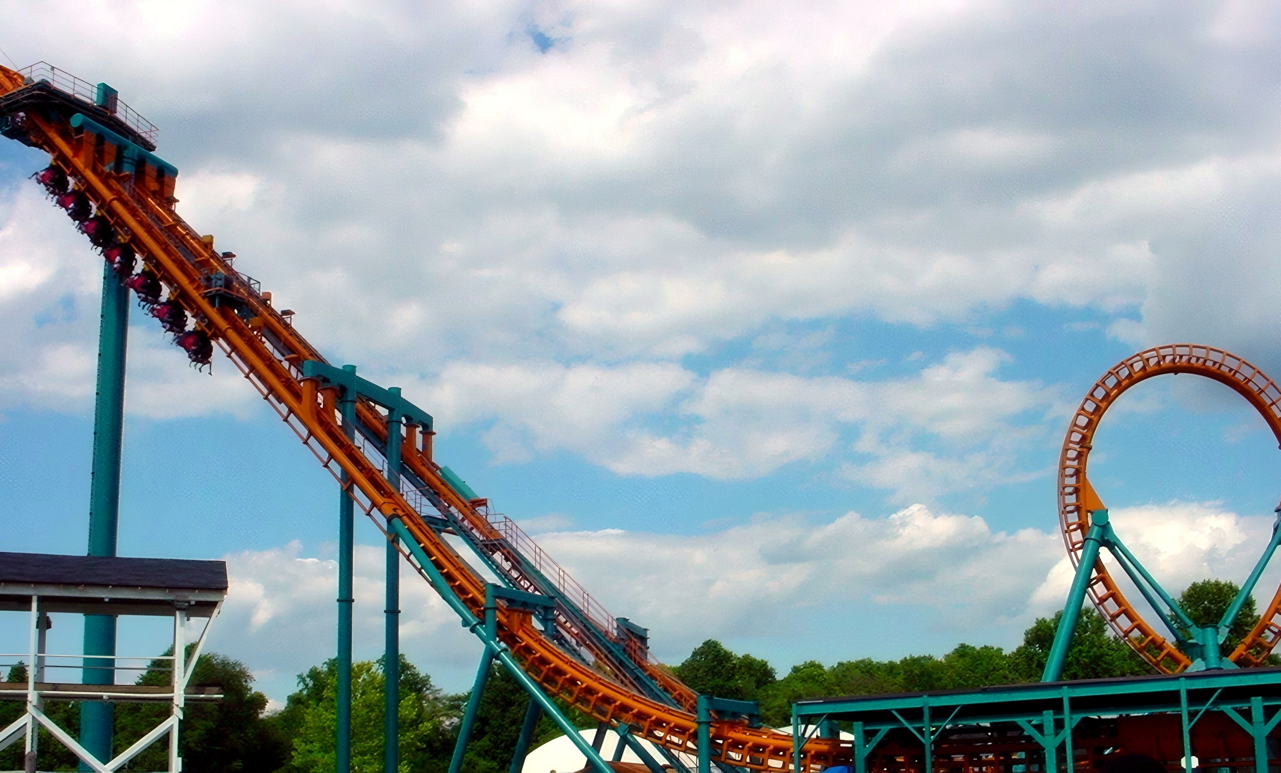 A Two-Face: The Flip Side train on the inclined lift tower above the station at Six Flags America, July 2001