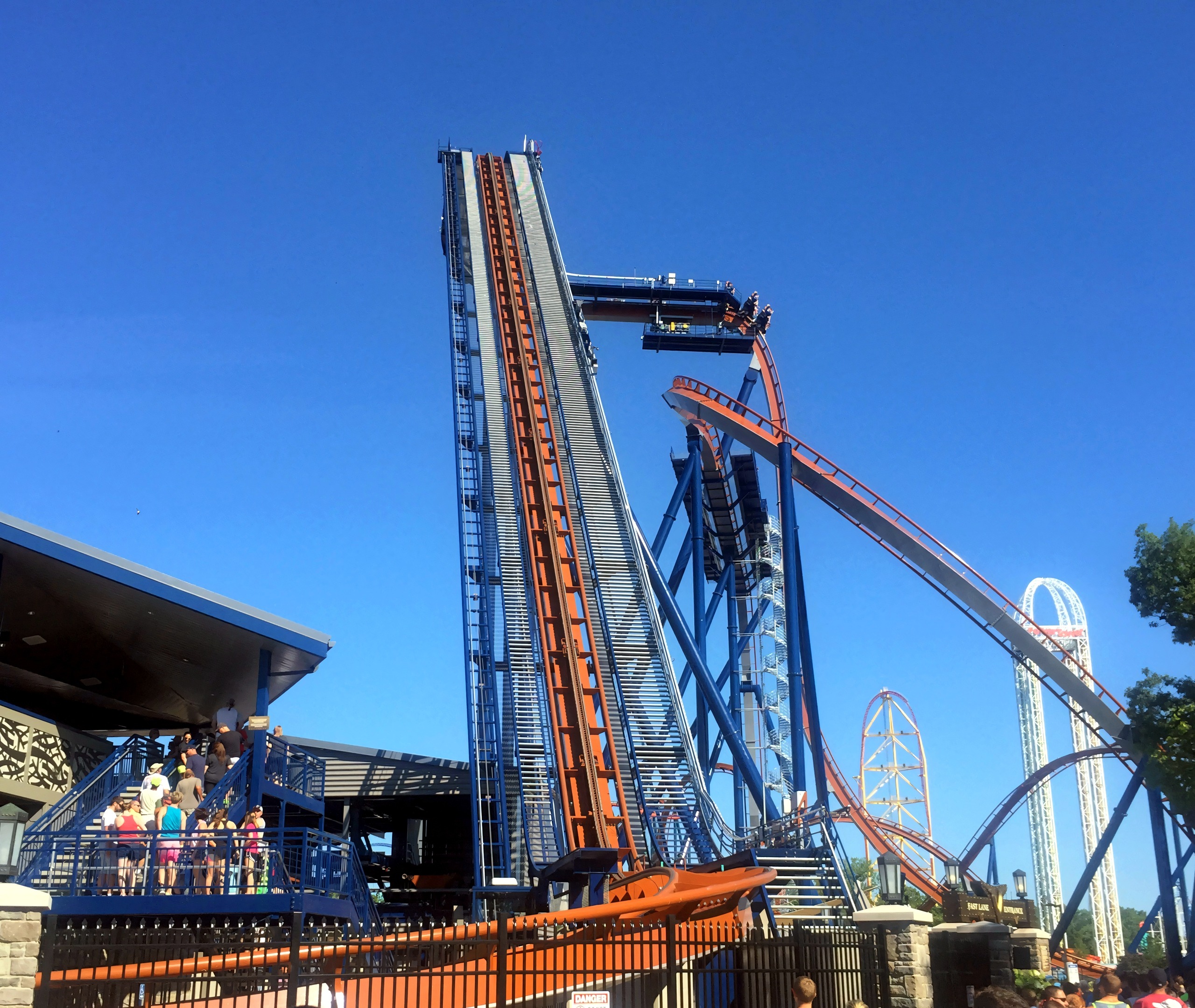 Coaster lift hill and station with fast-pass entrance sign, Valravn, July 2016
