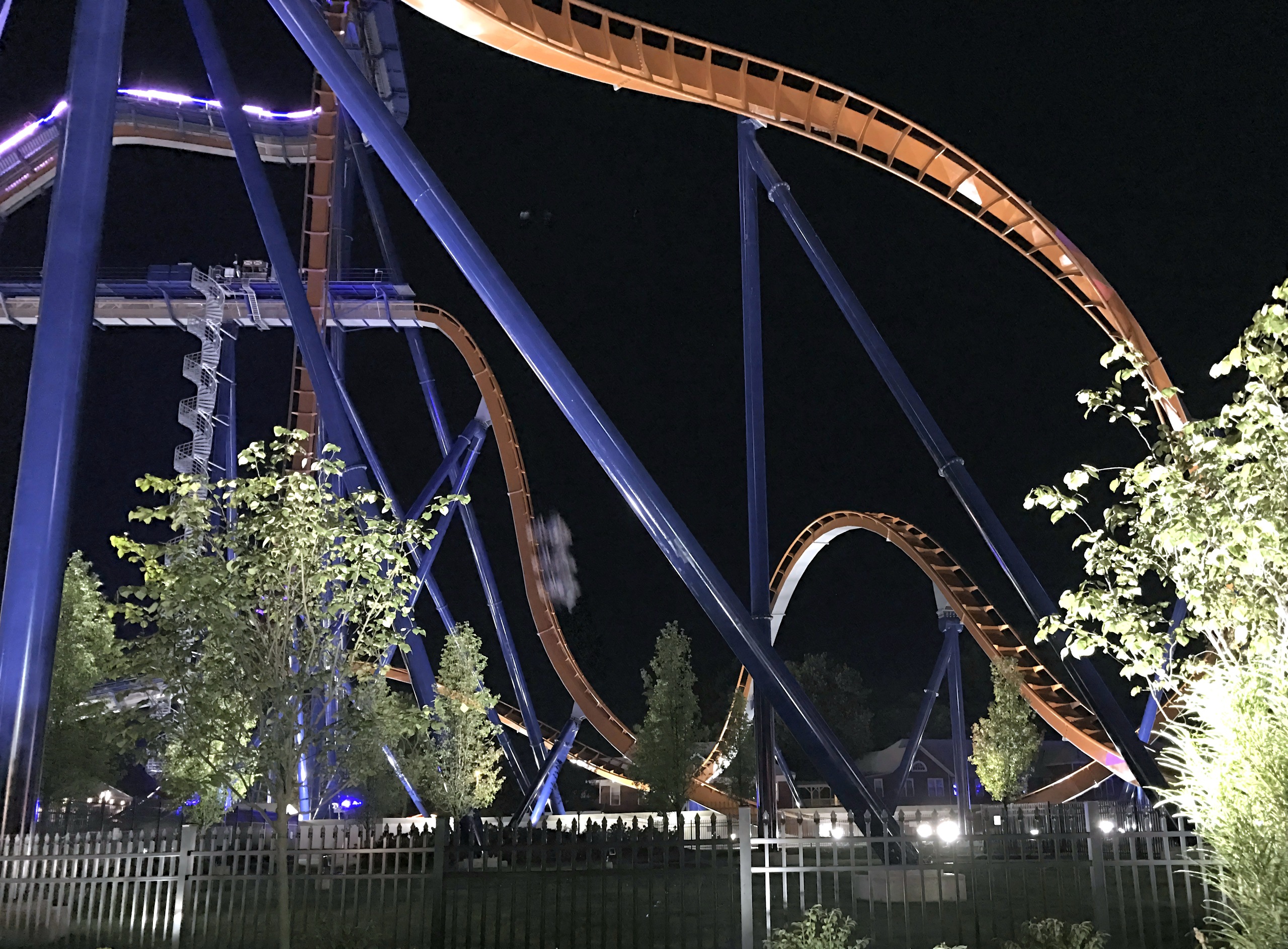 Maverick coaster track and blue supports at night, tree lit, Valravn, October 2016