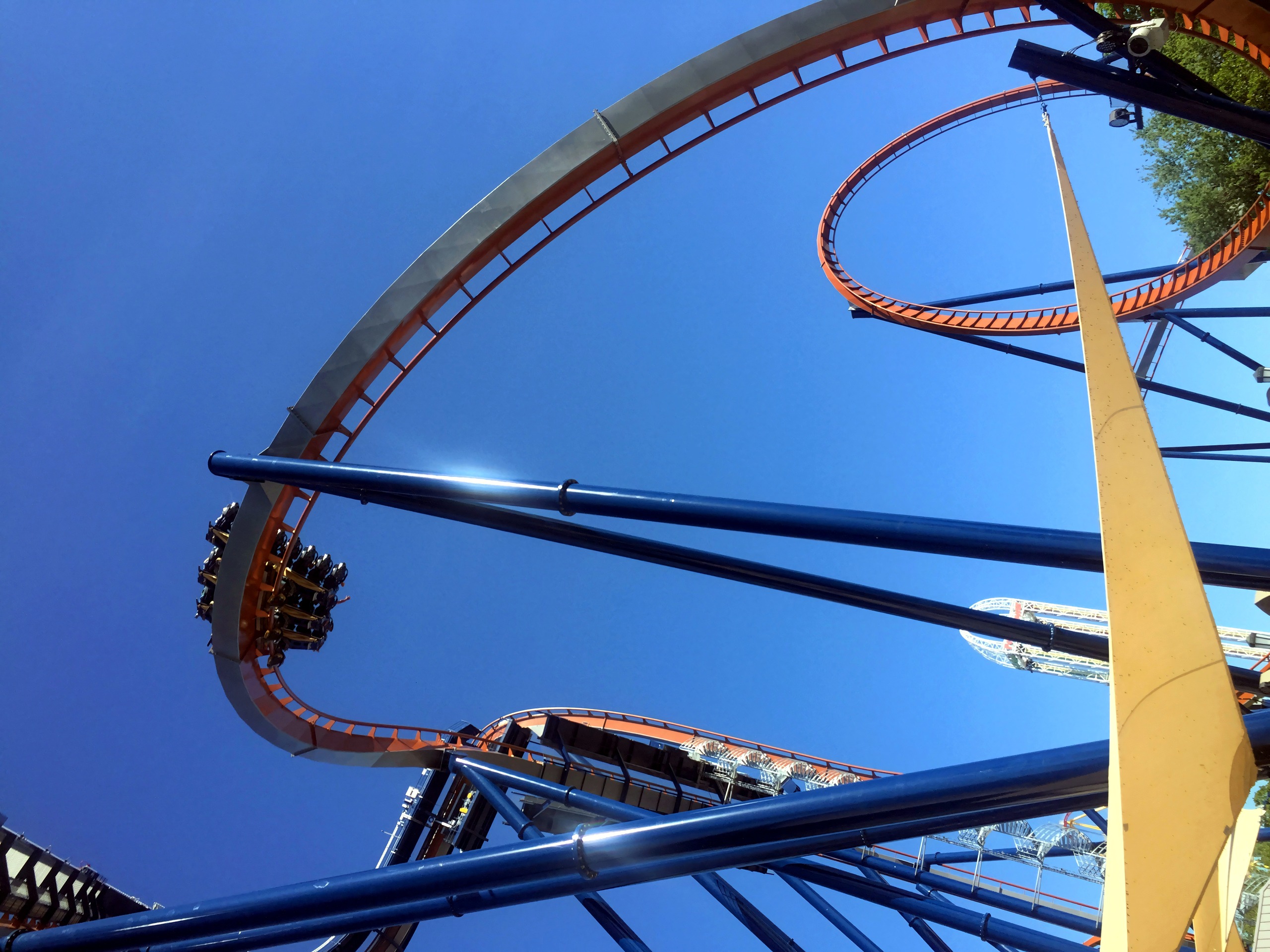 Raptor inverted train diving through loop, riders visible, Valravn, July 2016