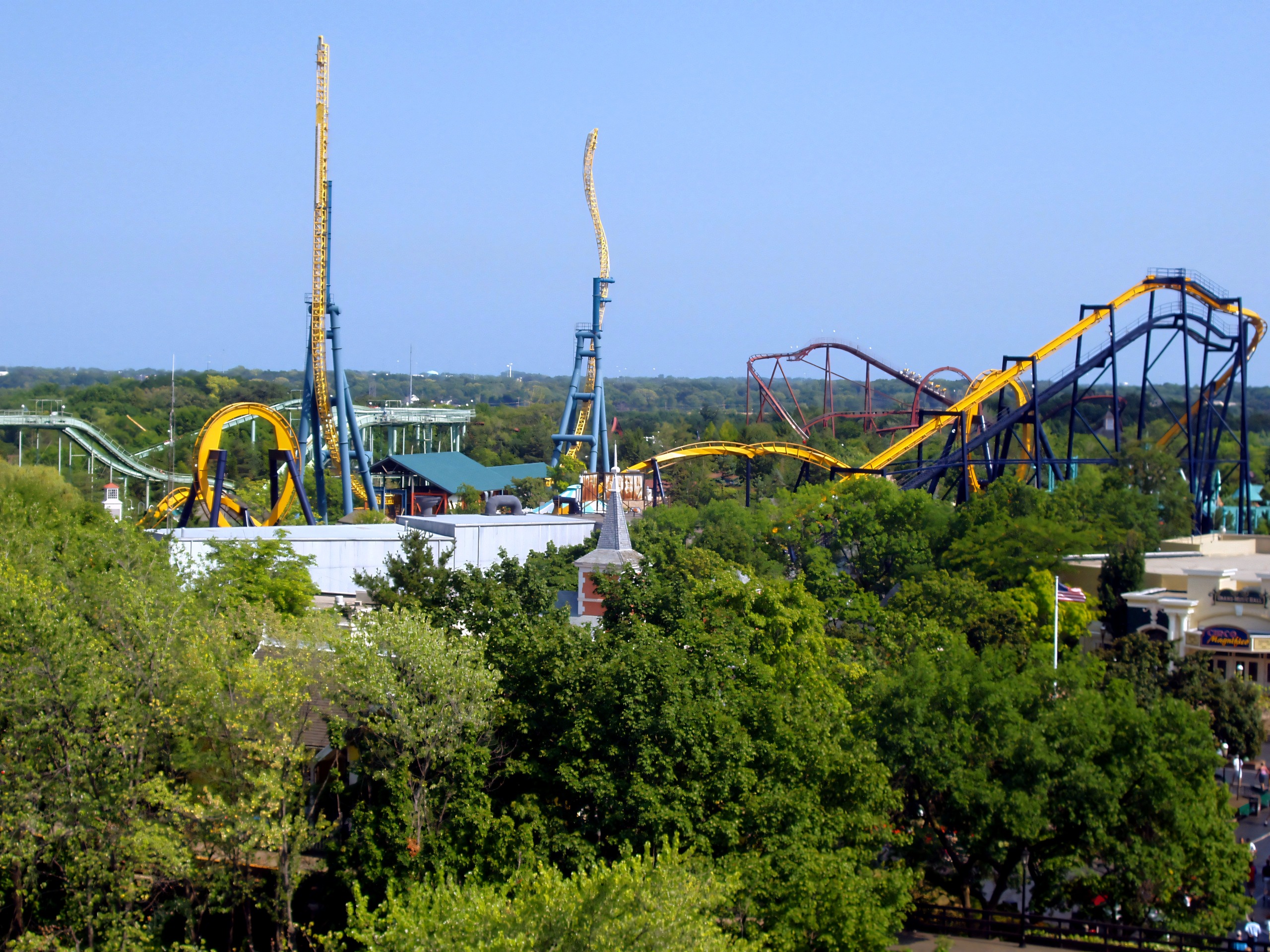 Vertical Velocity's spikes and Batman: The Ride's track over the trees at Six Flags Great America, August 2005