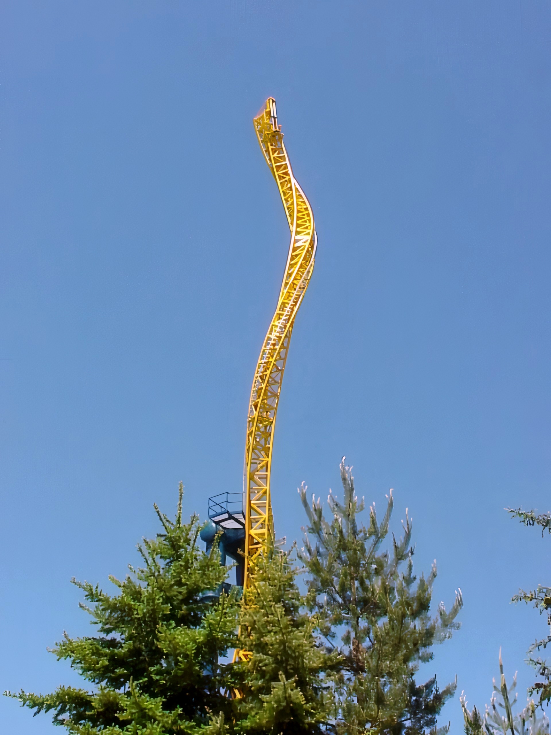 A Vertical Velocity train riding up the twisted front spike at Six Flags Great America, May 2001