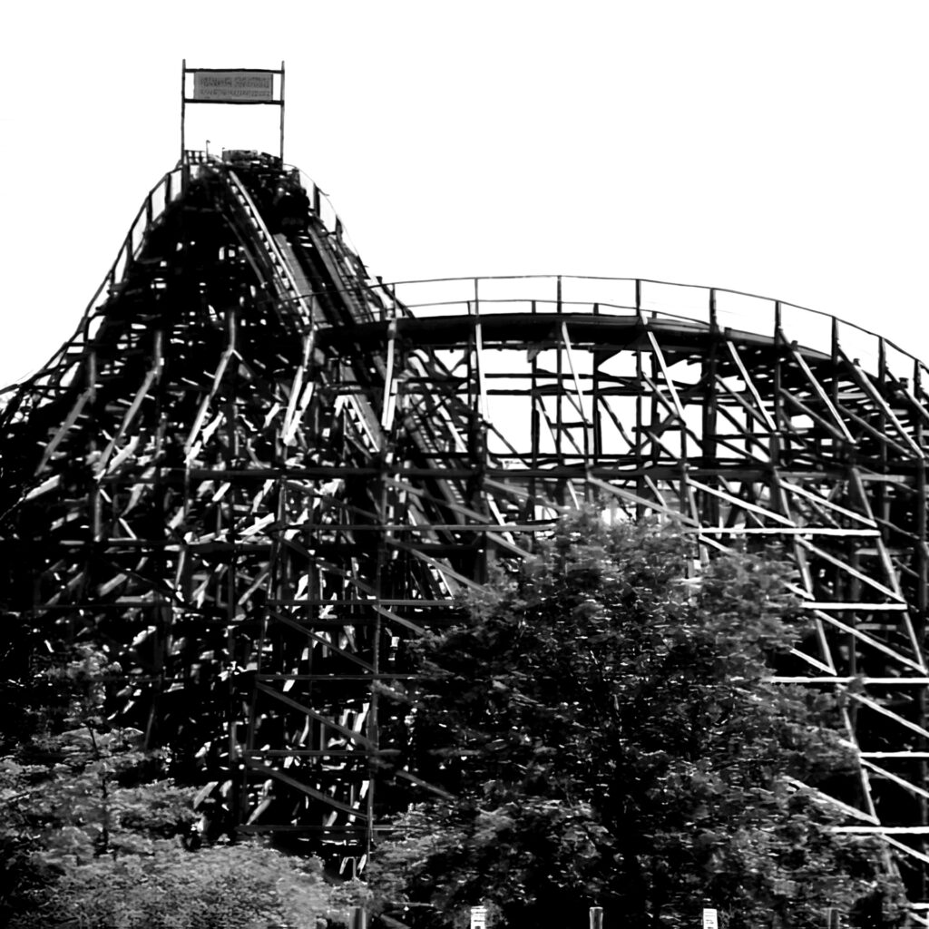 Viper at Six Flags Great America: the wooden lift hill and structure against the sky in black and white
