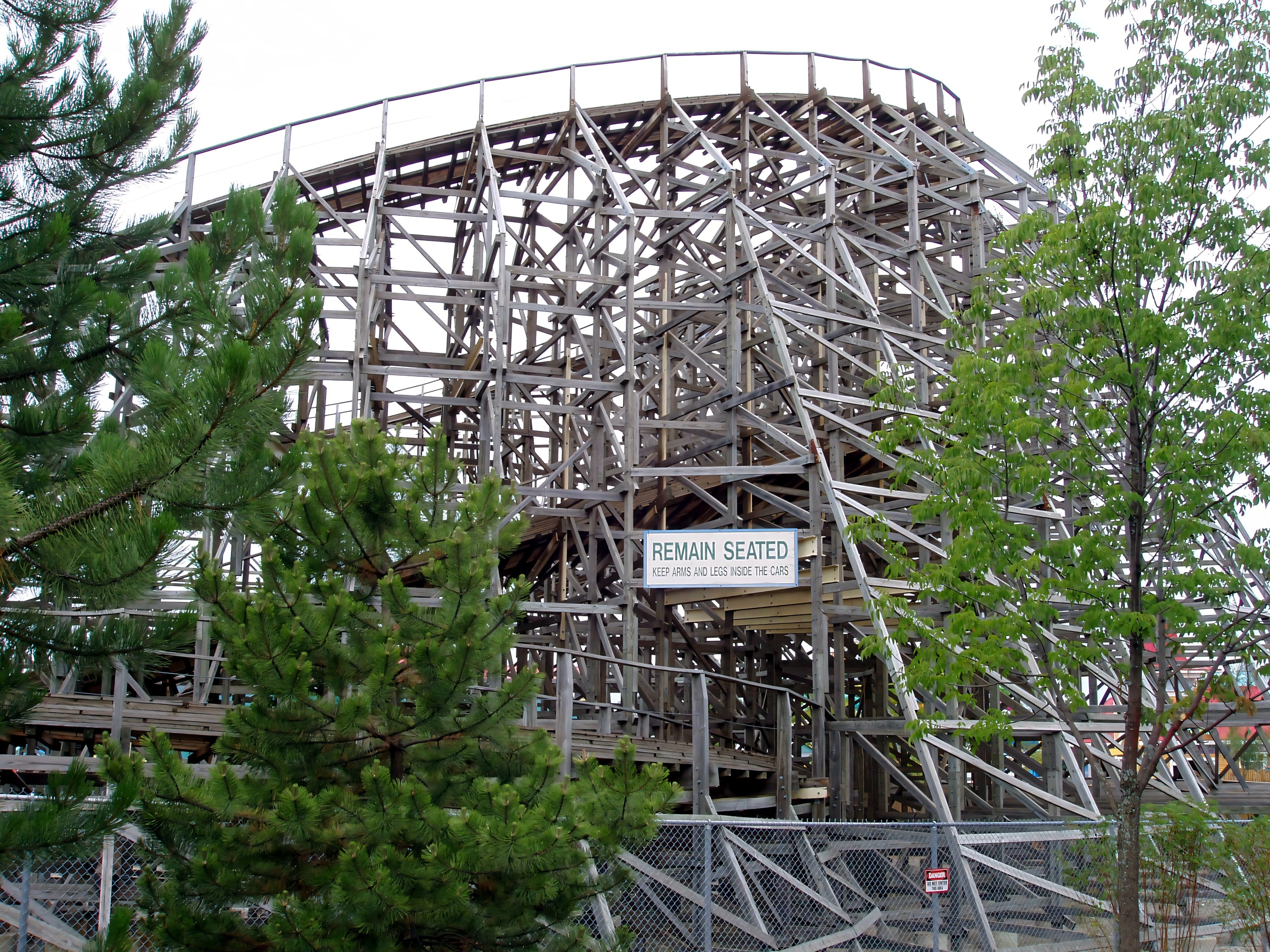 Viper's wooden lattice up close behind the trees at Six Flags Great America, August 2005