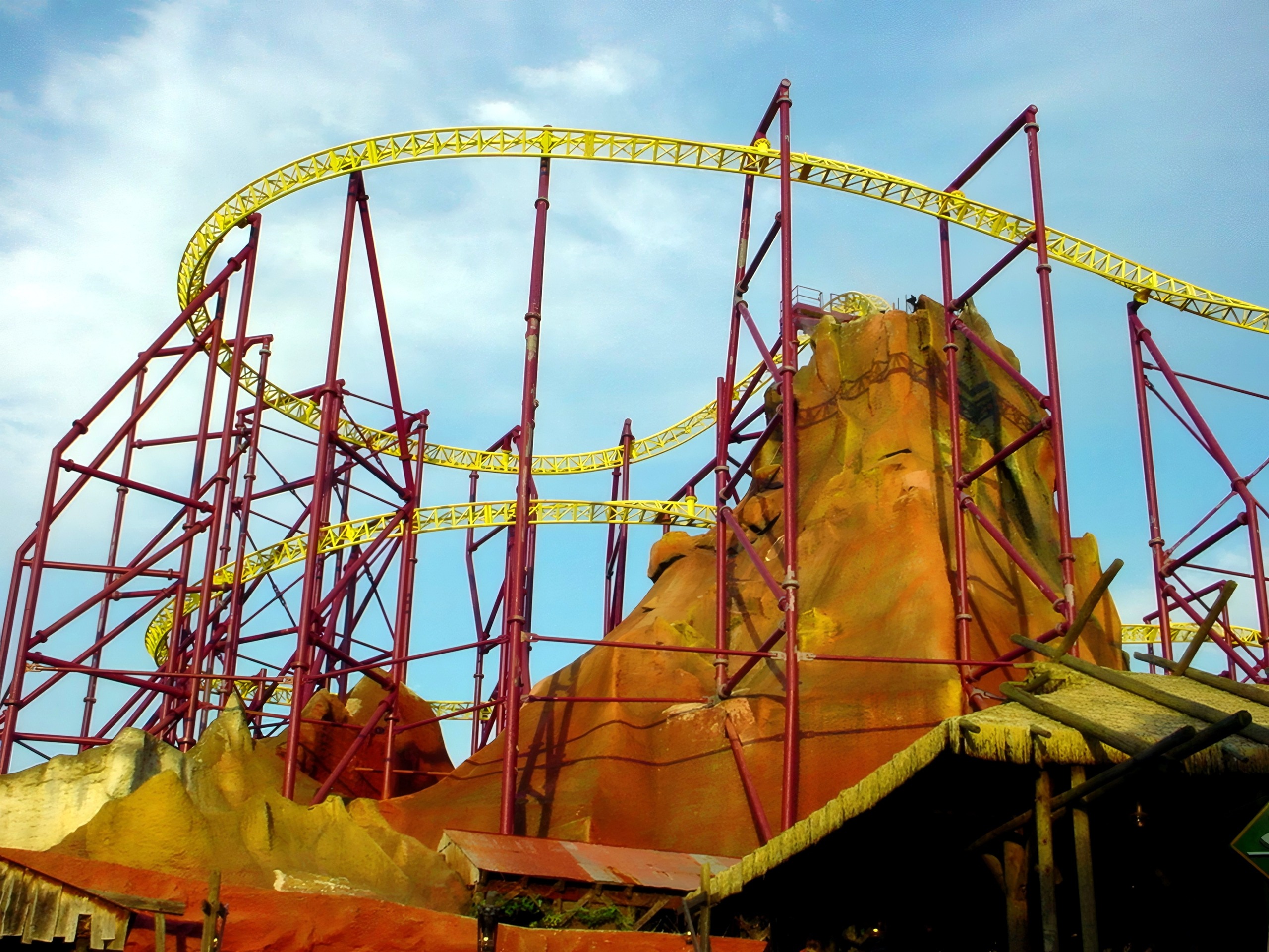 Volcano's yellow track and supports beside the mountain, July 2001