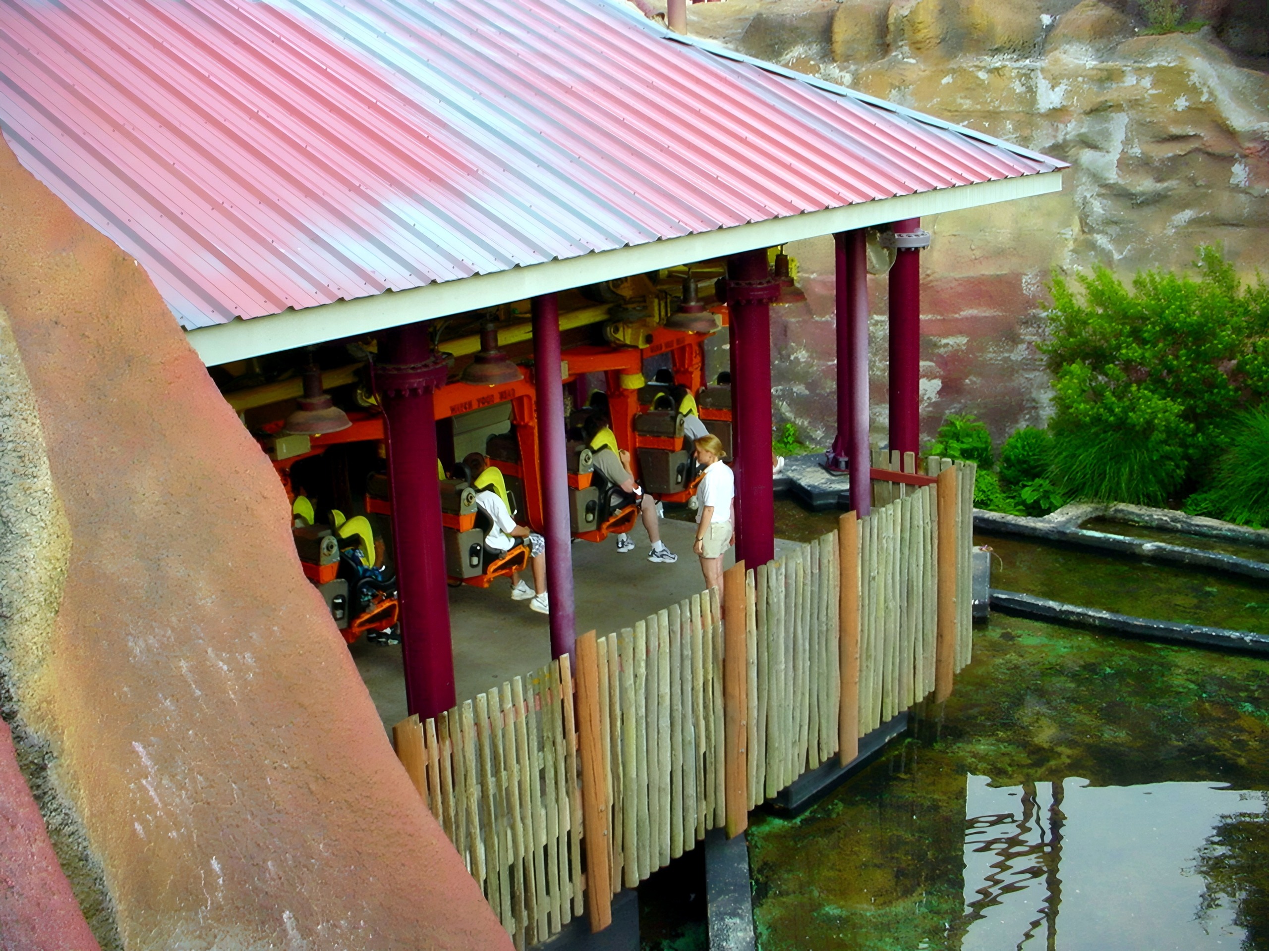 A Volcano train loading in the red-roofed station, July 2001
