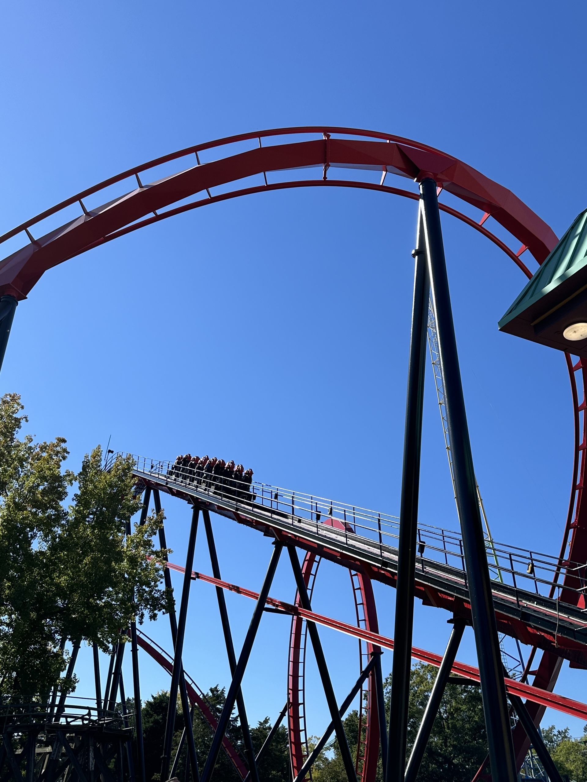 A Vortex train near the top of the lift under the loop, Carowinds, October 2024