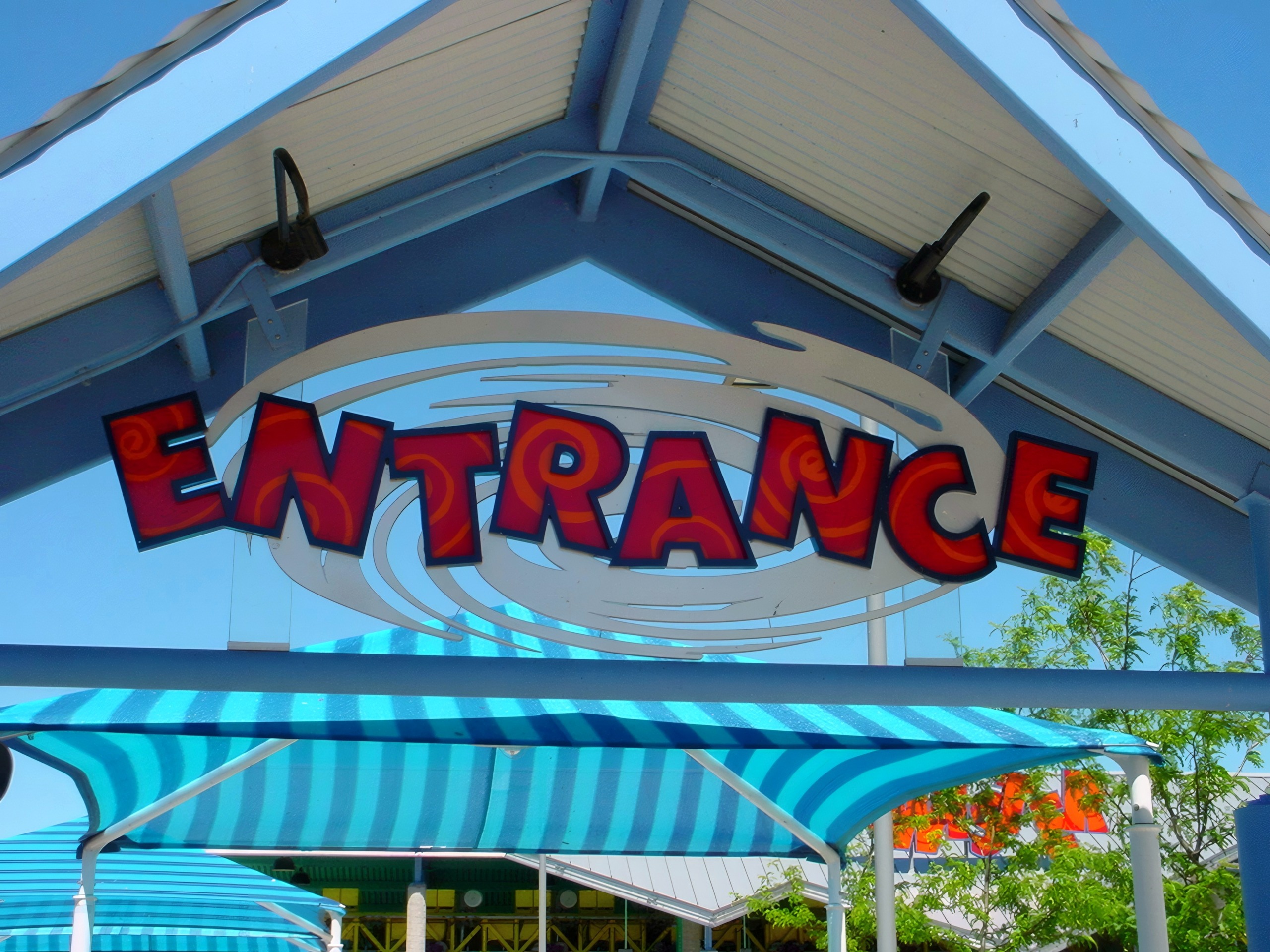 Cedar Point entrance sign with striped canopy, Wicked Twister, July 2003