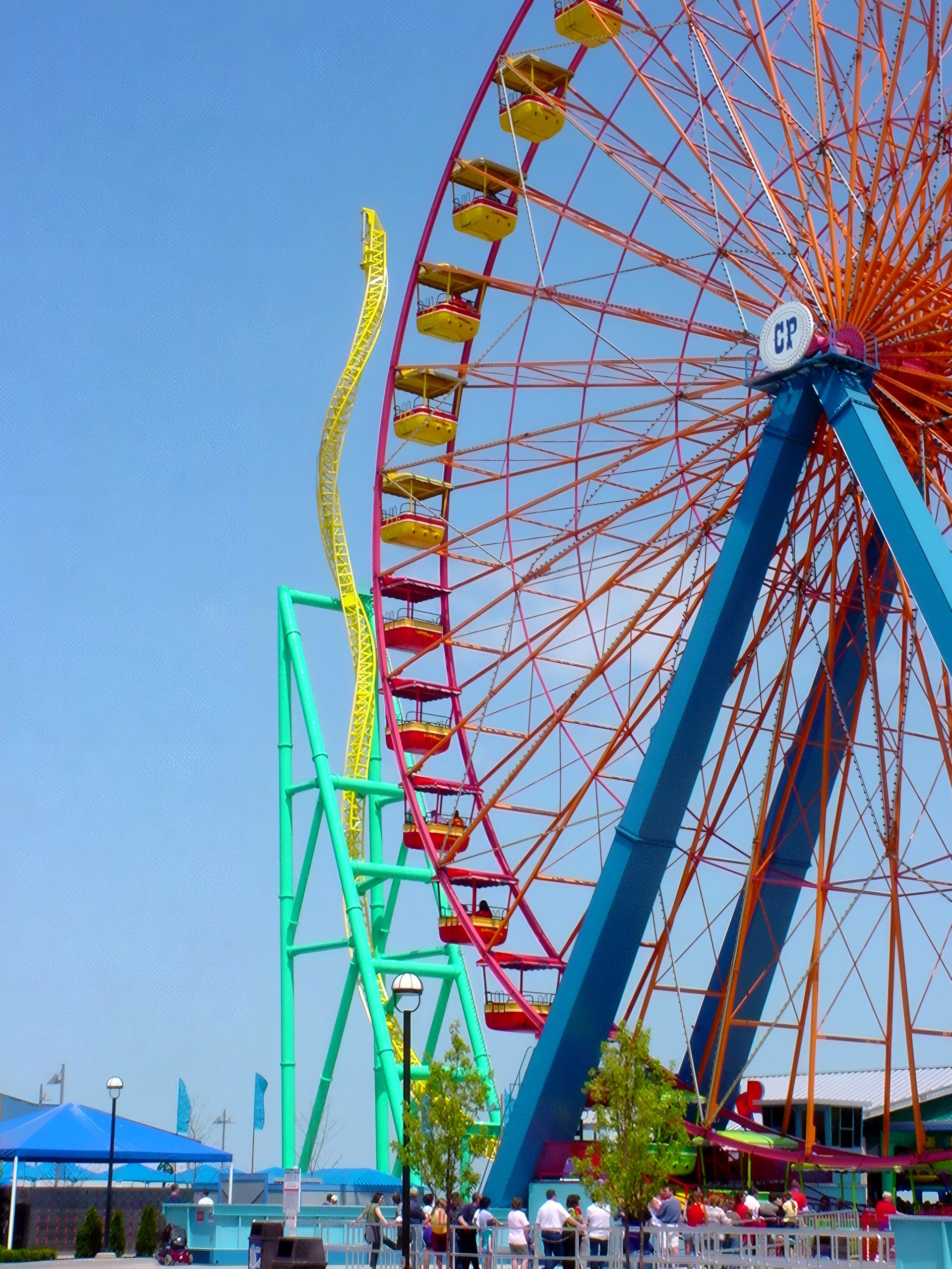 Ferris wheel beside yellow twisted coaster track, Wicked Twister, May 2002