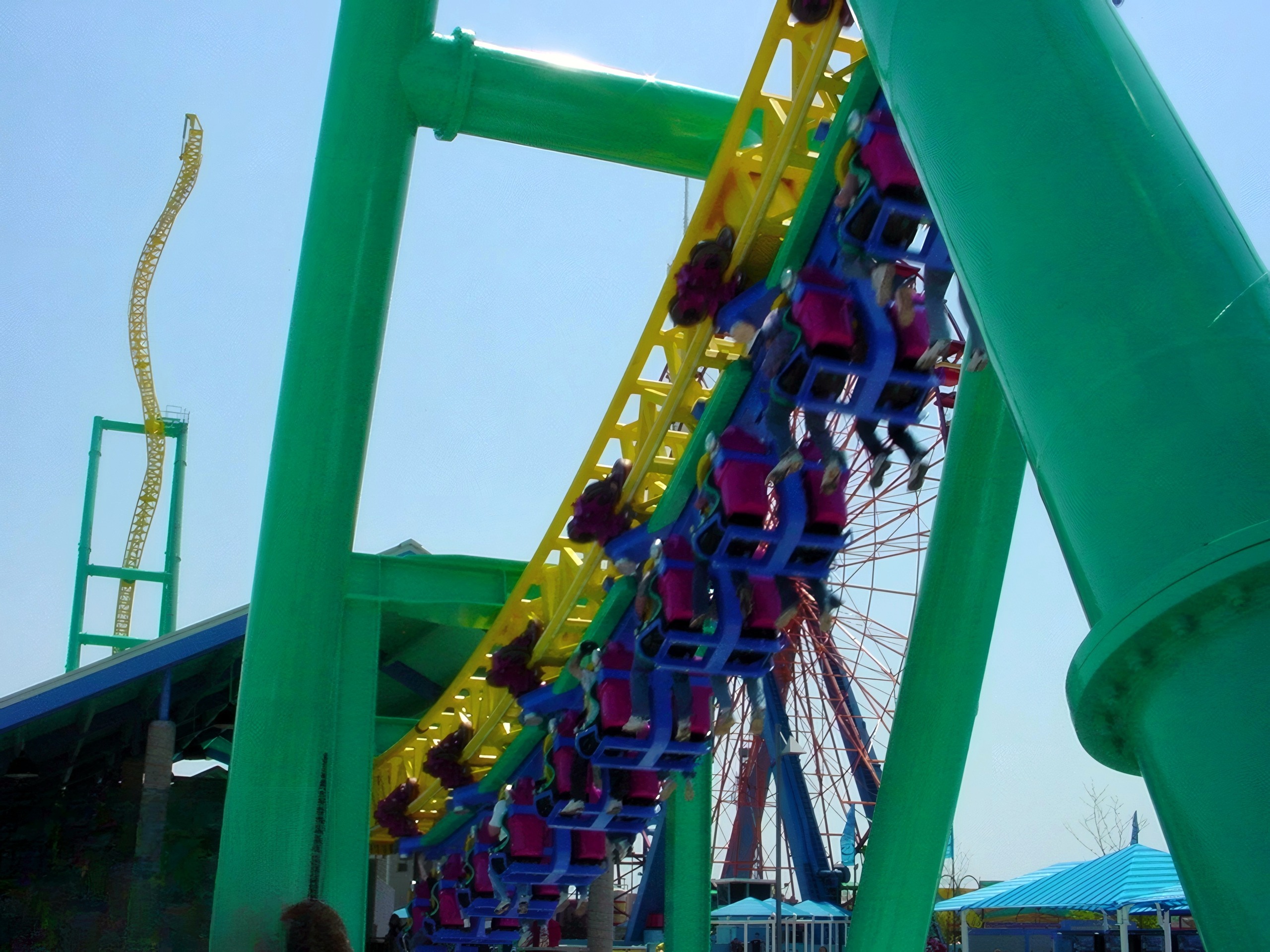 Riders climbing inverted on Wicked Twister's twisted spike, Wicked Twister, May 2002