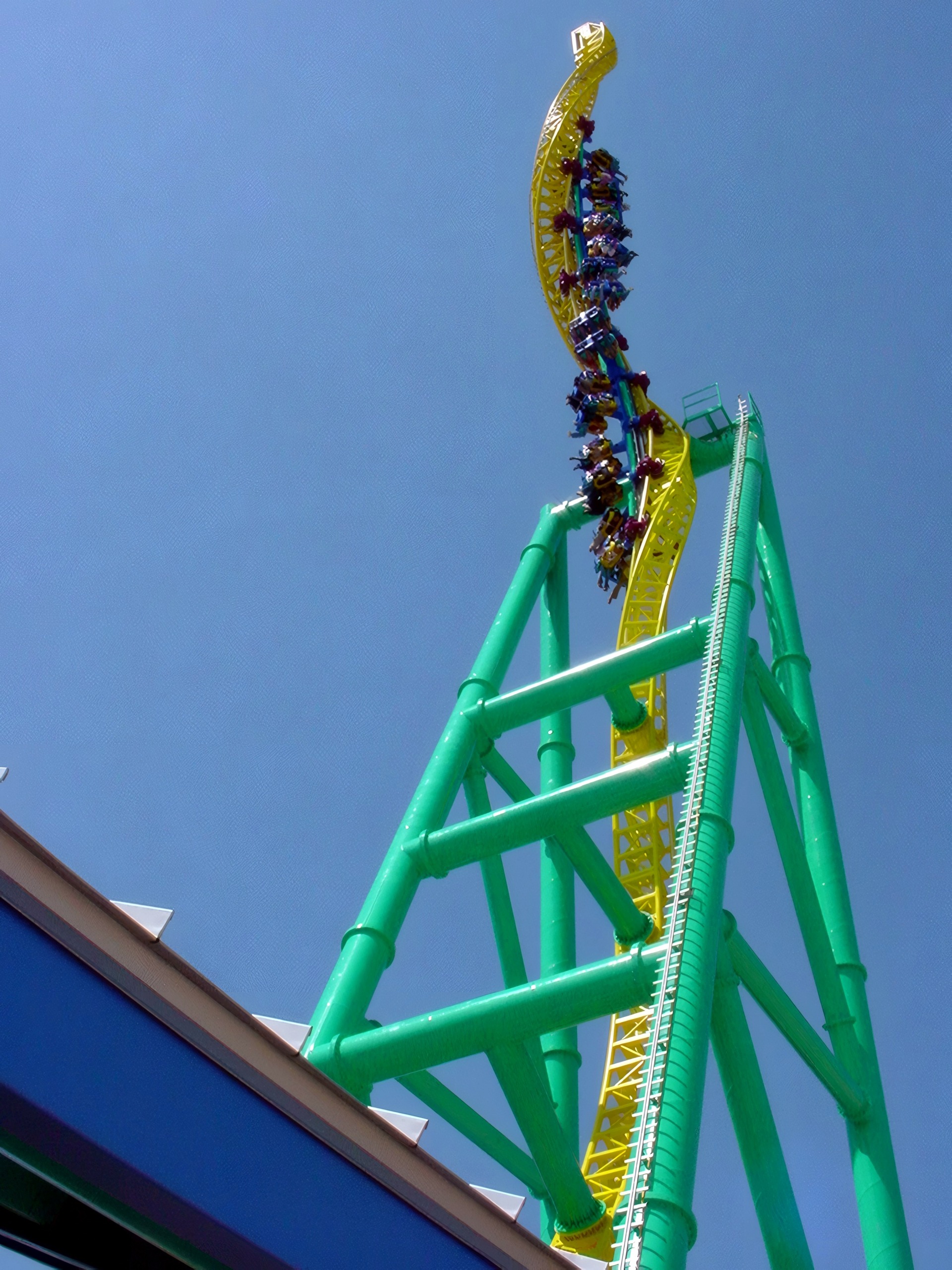 Train ascending Wicked Twister's spiraling tower with riders visible, Wicked Twister, May 2002