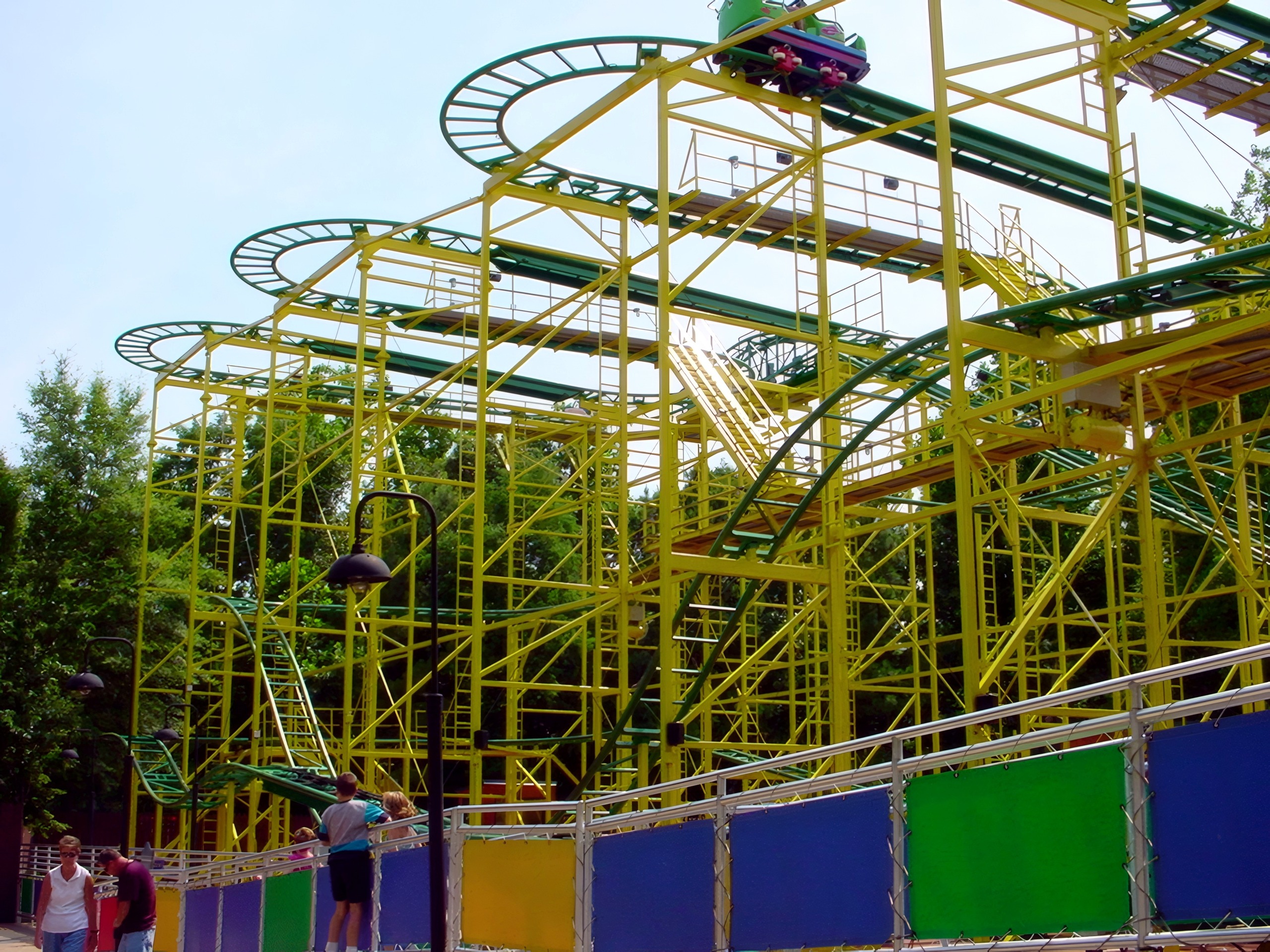 A Wilde Maus car on the upper switchback track above the yellow structure at Busch Gardens Williamsburg, July 2001