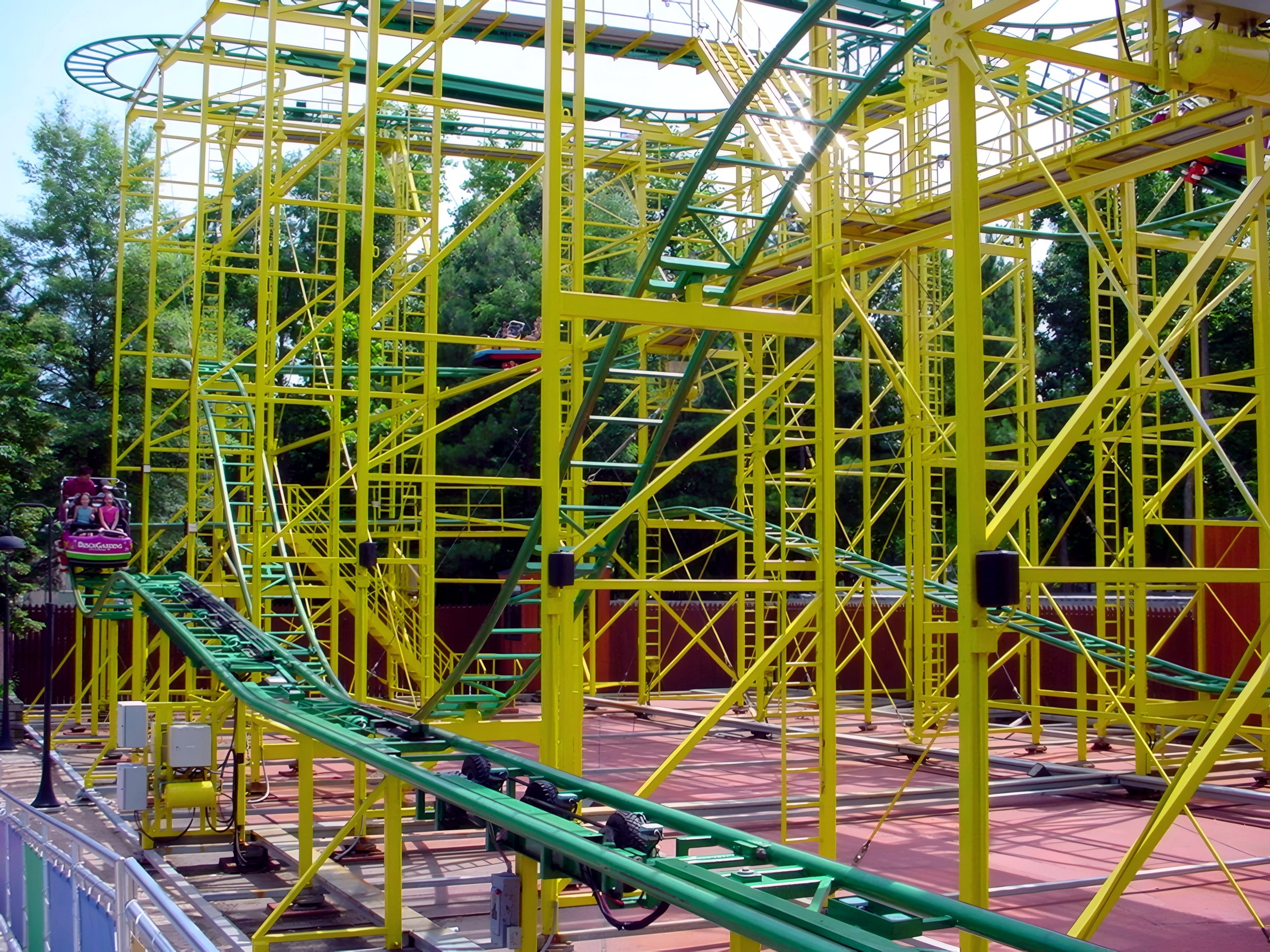 The green Wilde Maus track winding through the yellow structure at Busch Gardens Williamsburg, July 2001