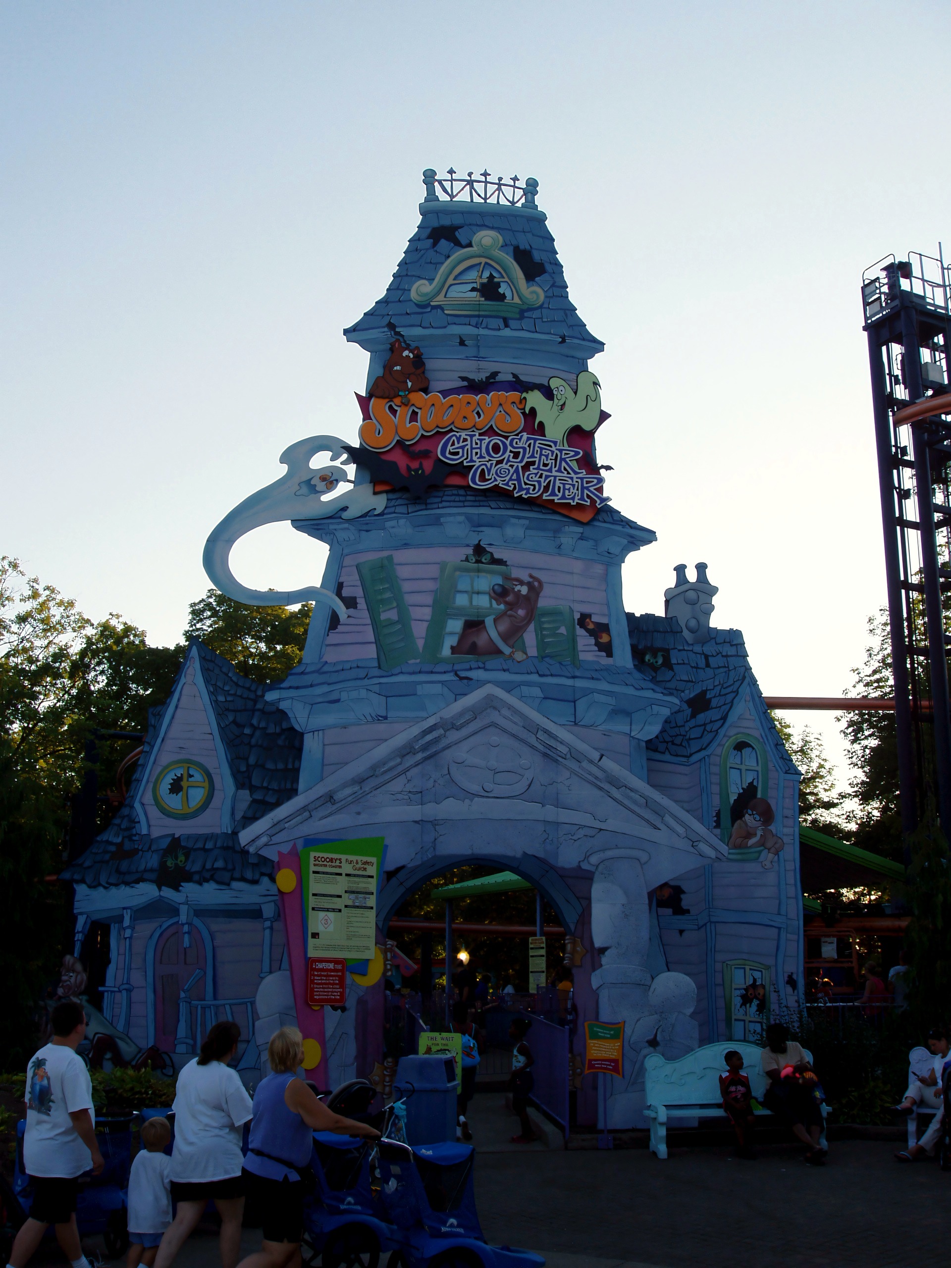 Ghoster Coaster kiddie ride entrance, ghost-themed facade, visitors outside, Woodstock Express, July 2005
