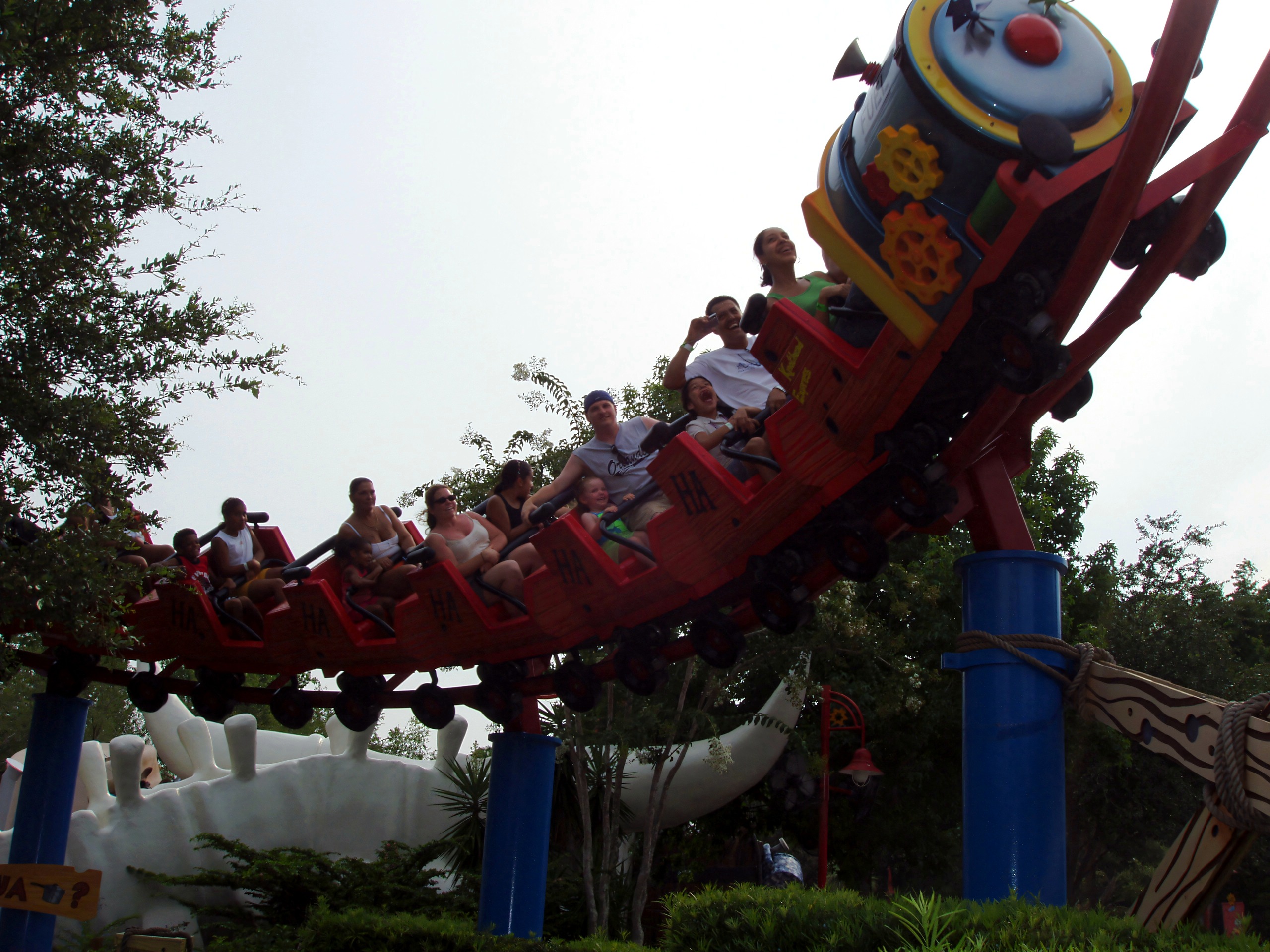 A Woody Woodpecker's Nuthouse Coaster train banking down a turn at Universal Studios Florida, June 2006