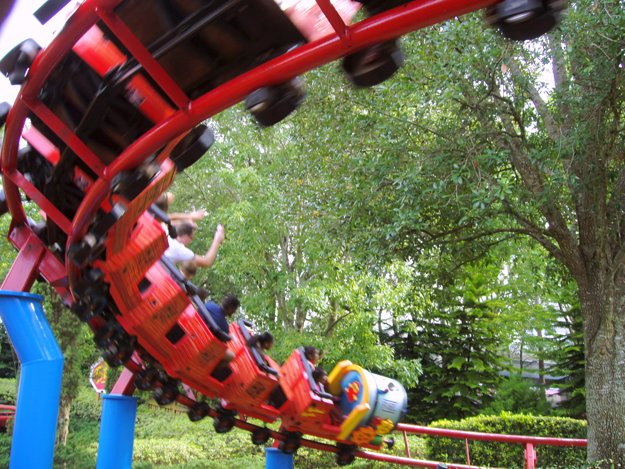 A Woody Woodpecker's Nuthouse Coaster train banking through a curve at Universal Studios Florida, June 2006