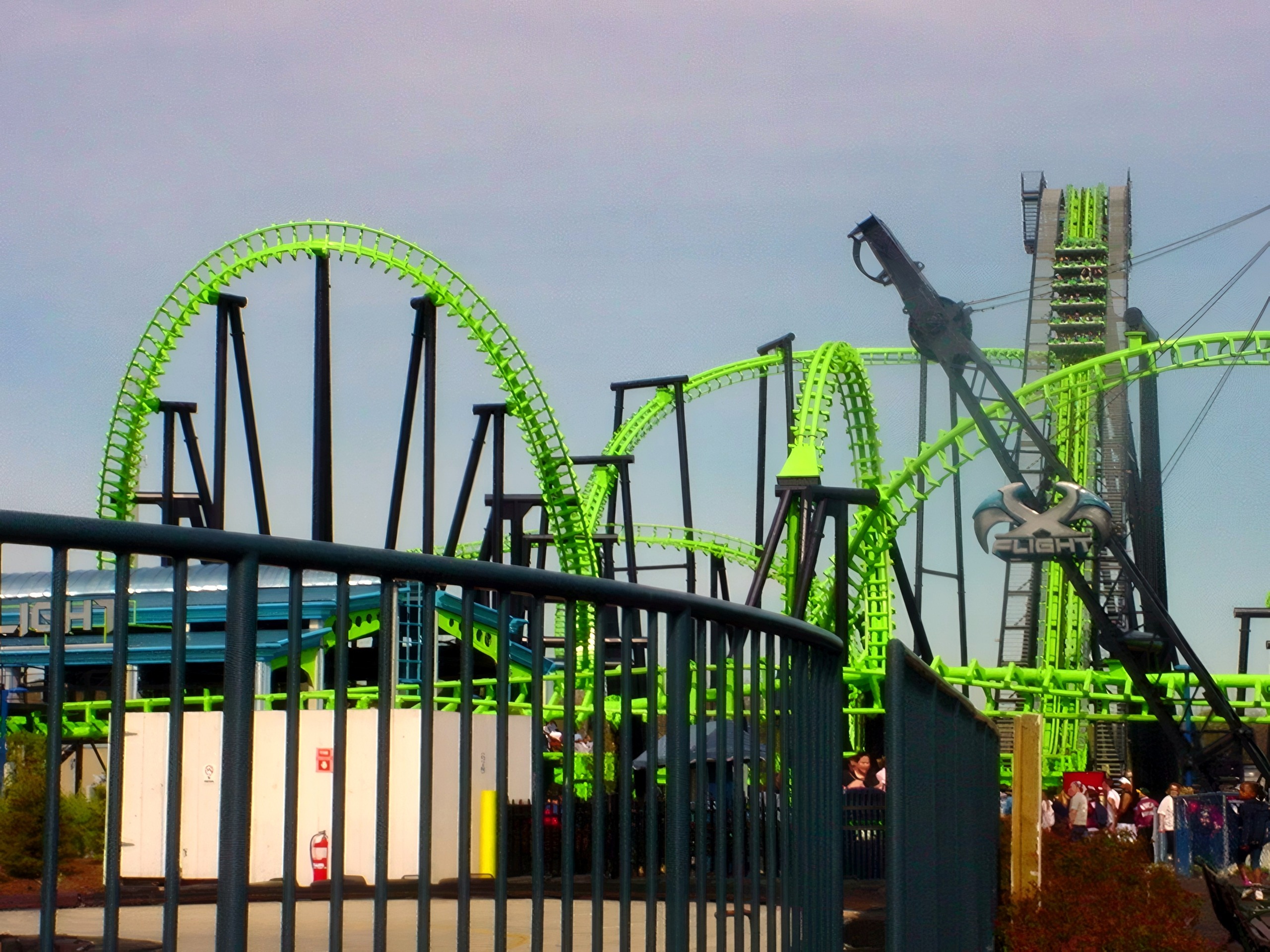 X-Flight's vertical lift tower and loop behind the queue fence, May 2002
