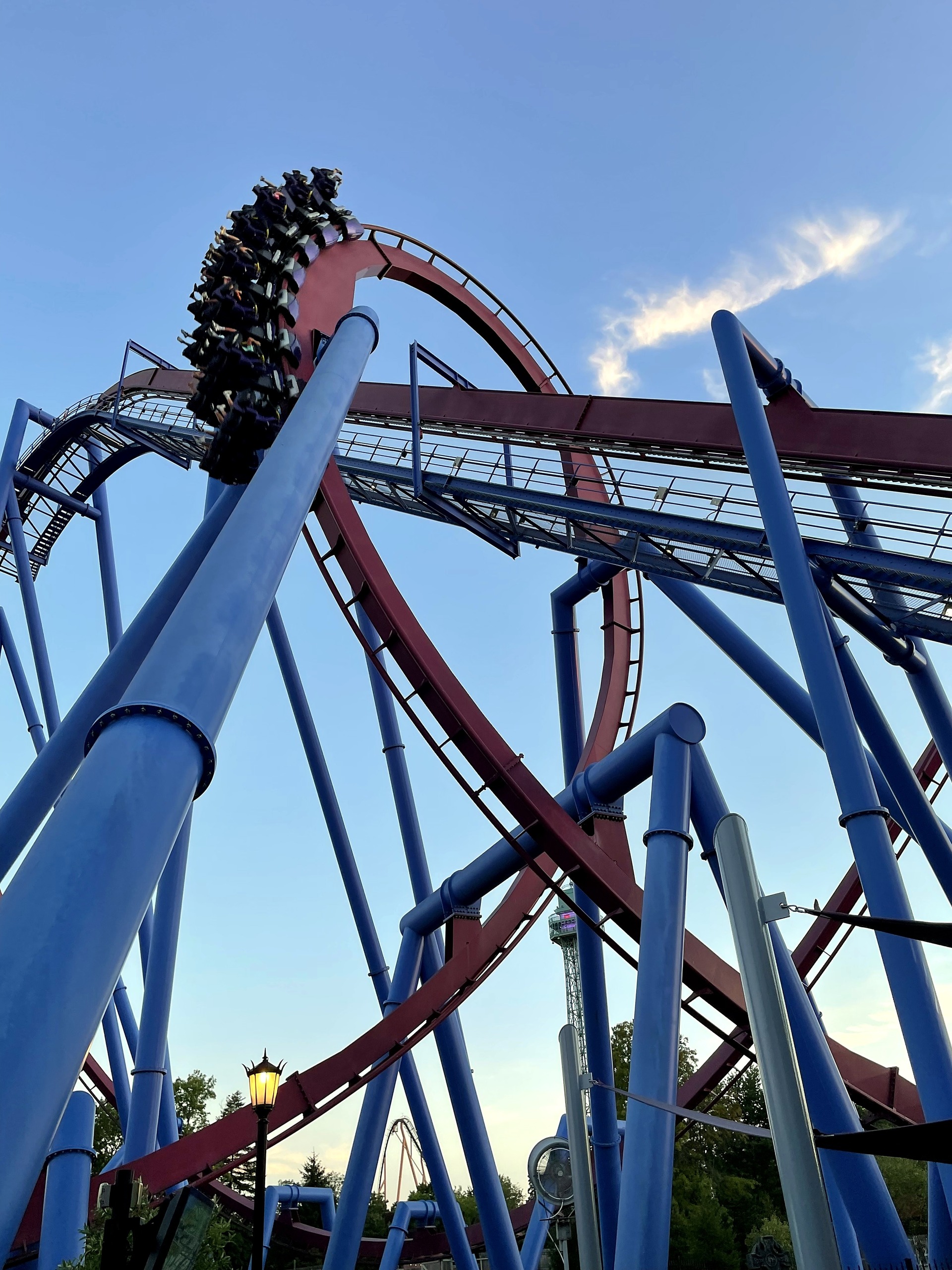 A Banshee train cresting the track above the vertical loop, Kings Island, July 2022
