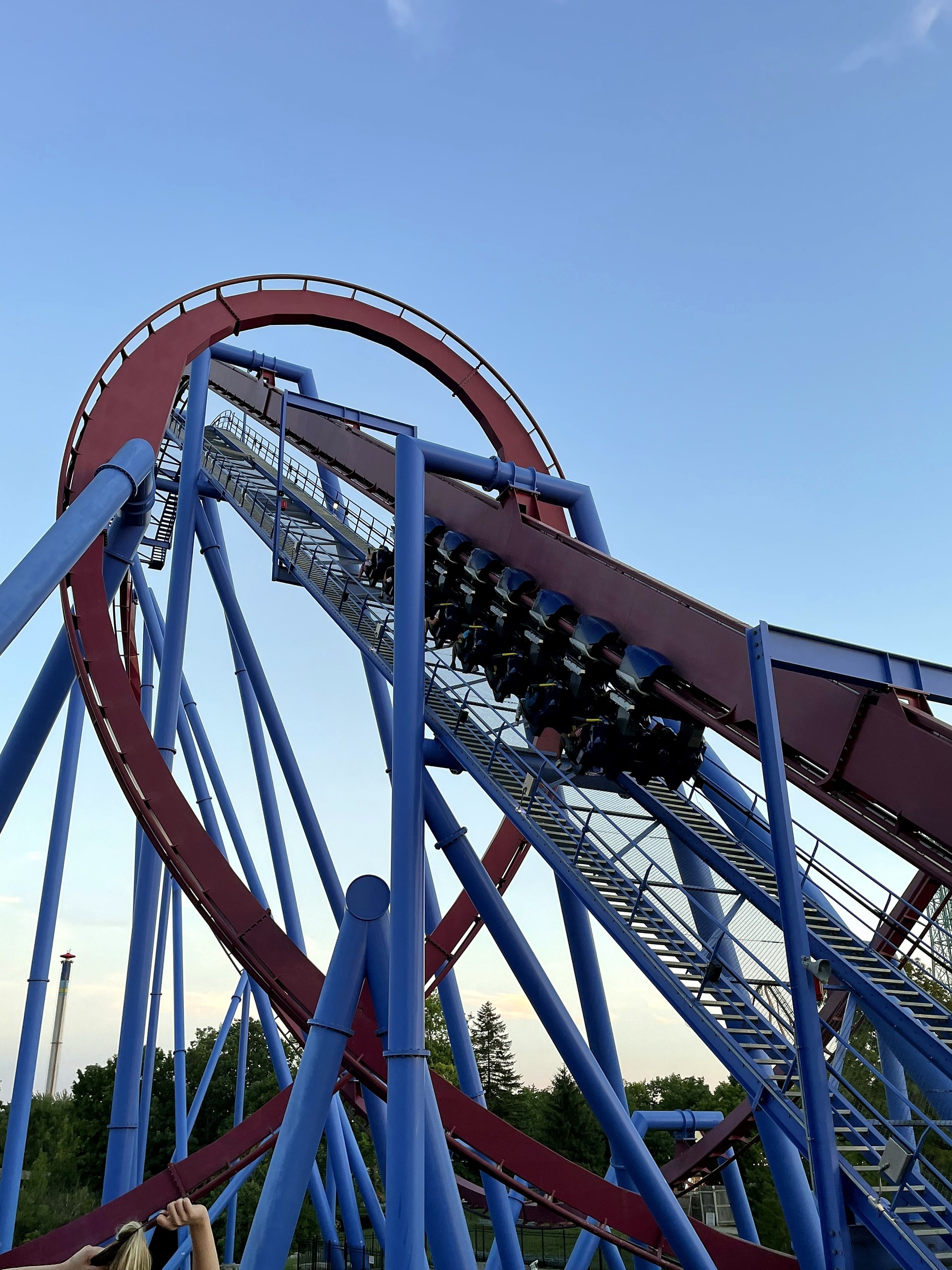 A Banshee train partway up the lift inside the loop, Kings Island, July 2022
