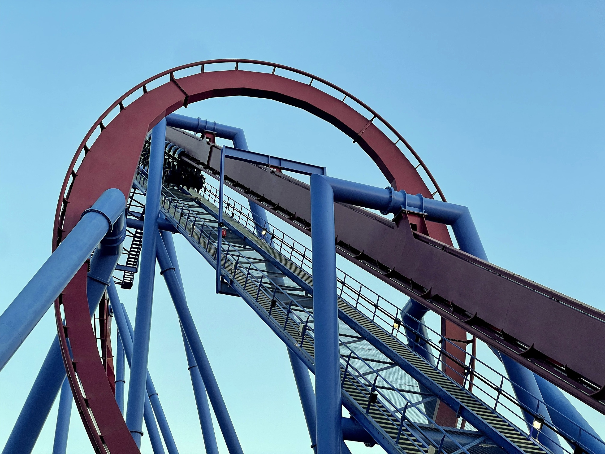 Close under Banshee's loop and the steel walkway of the lift hill, Kings Island, July 2022