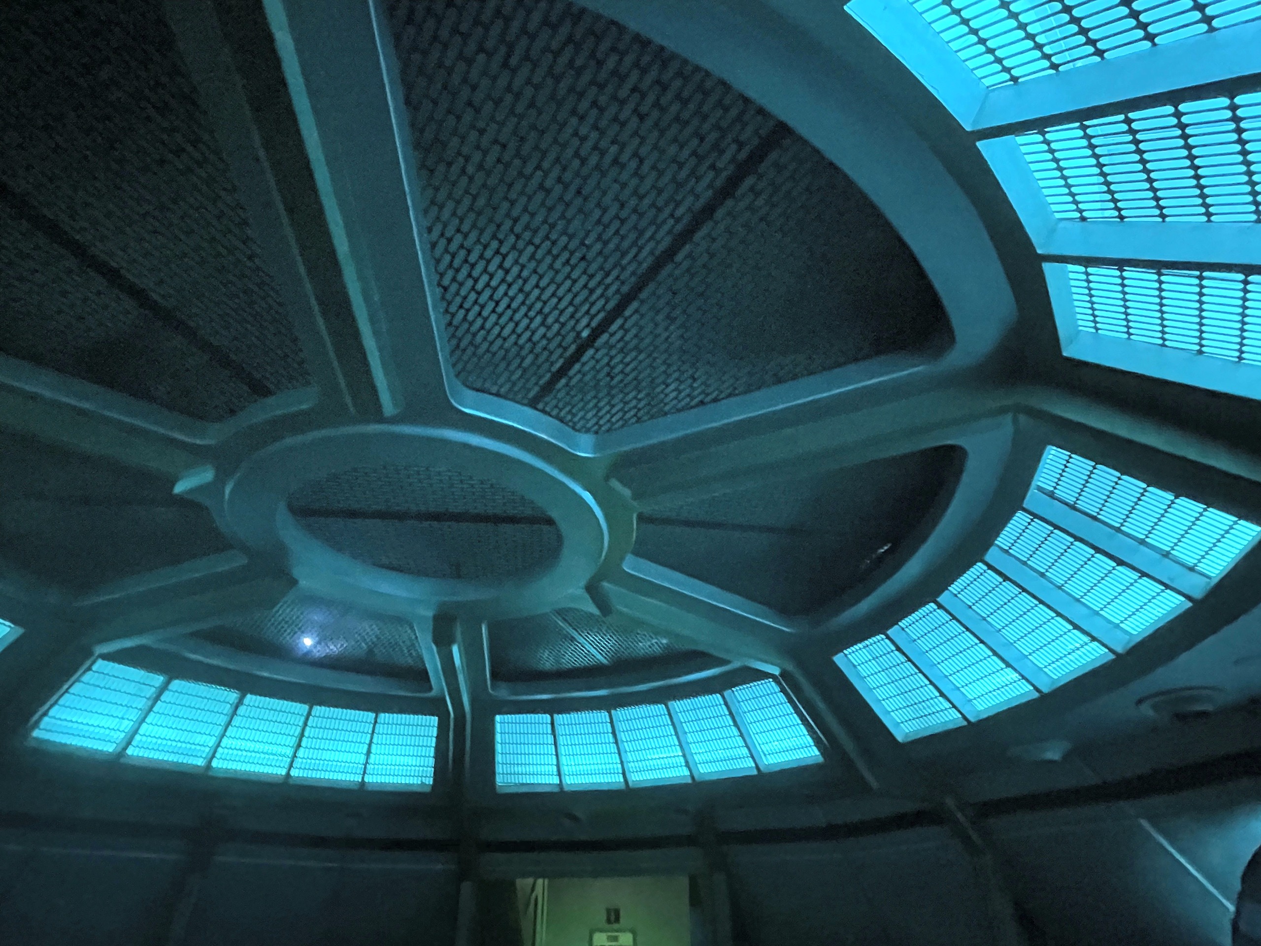 Looking up at the lit ceiling of the Flight of Fear saucer, Kings Island, July 2022
