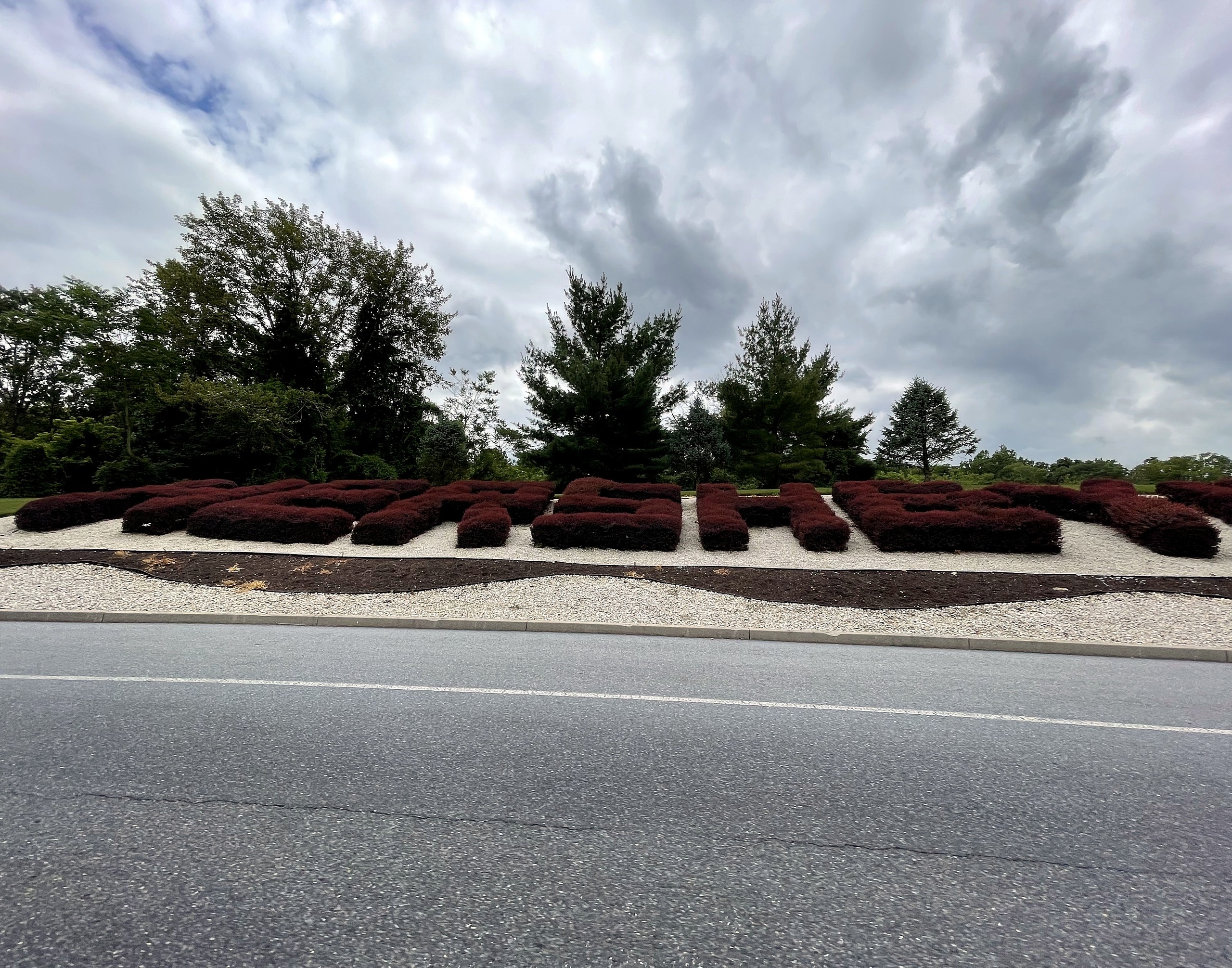 The HERSHEY hedge letters along the road outside the park at Hersheypark, June 2021