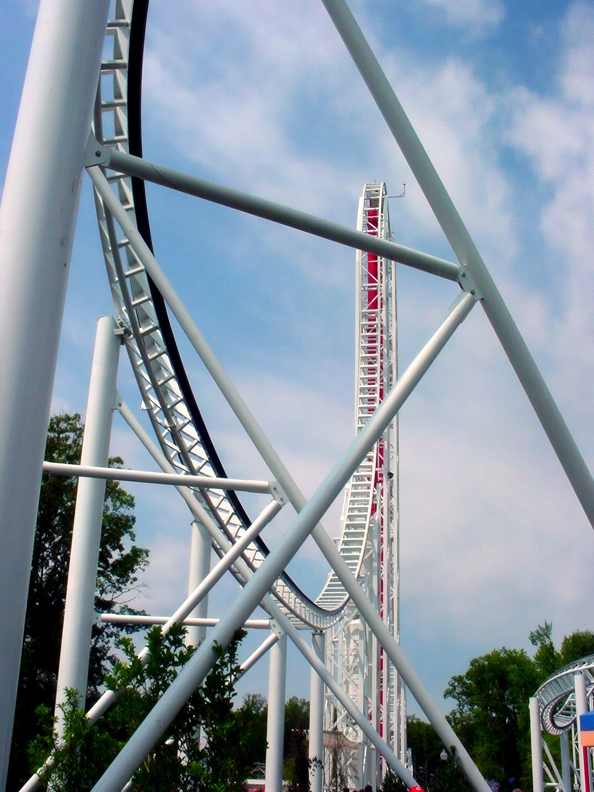 Hypersonic XLC's top hat seen through the white support columns at Kings Dominion, July 2001