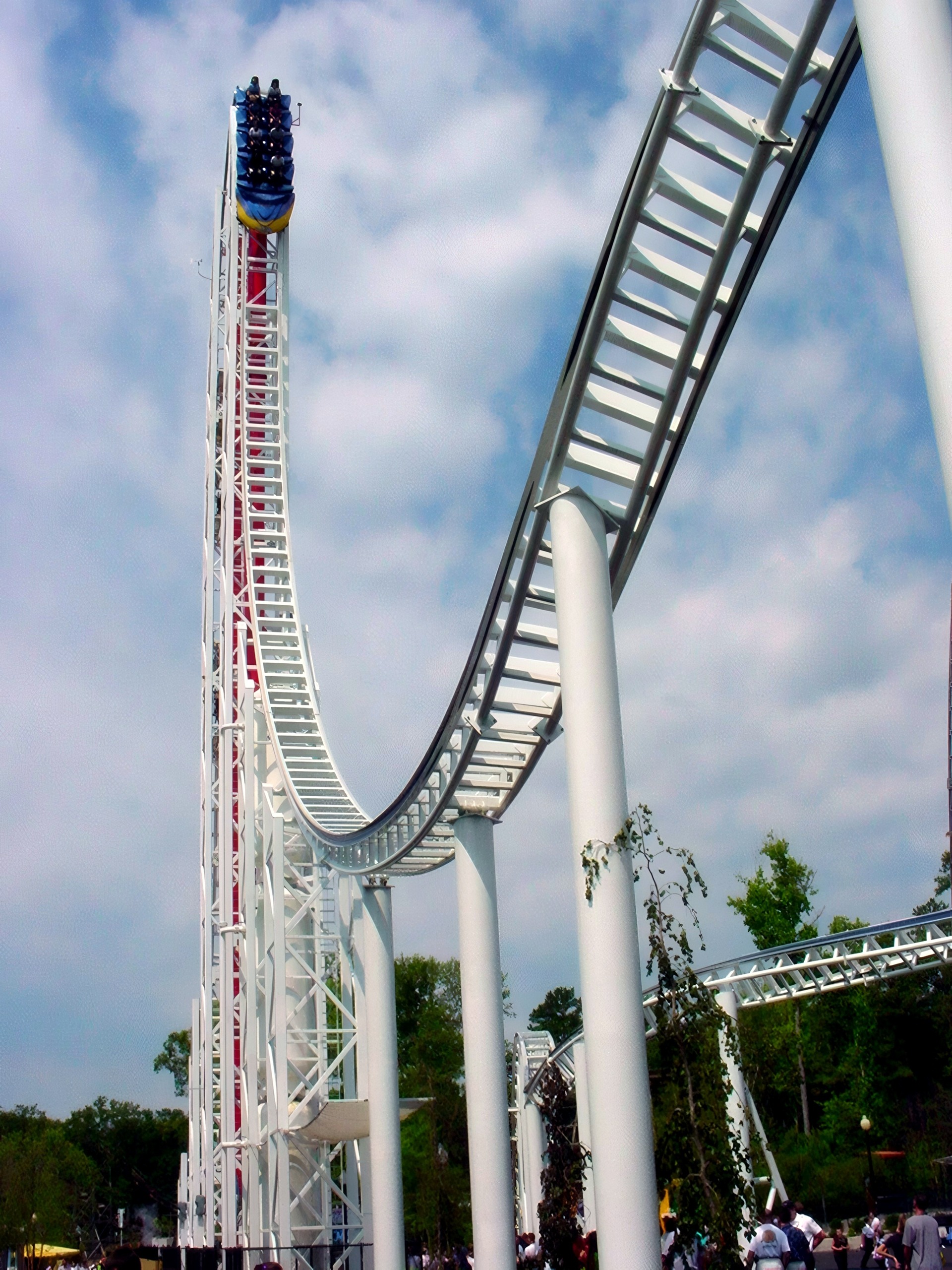 A Hypersonic XLC train at the top of the top hat above the curving track at Kings Dominion, July 2001