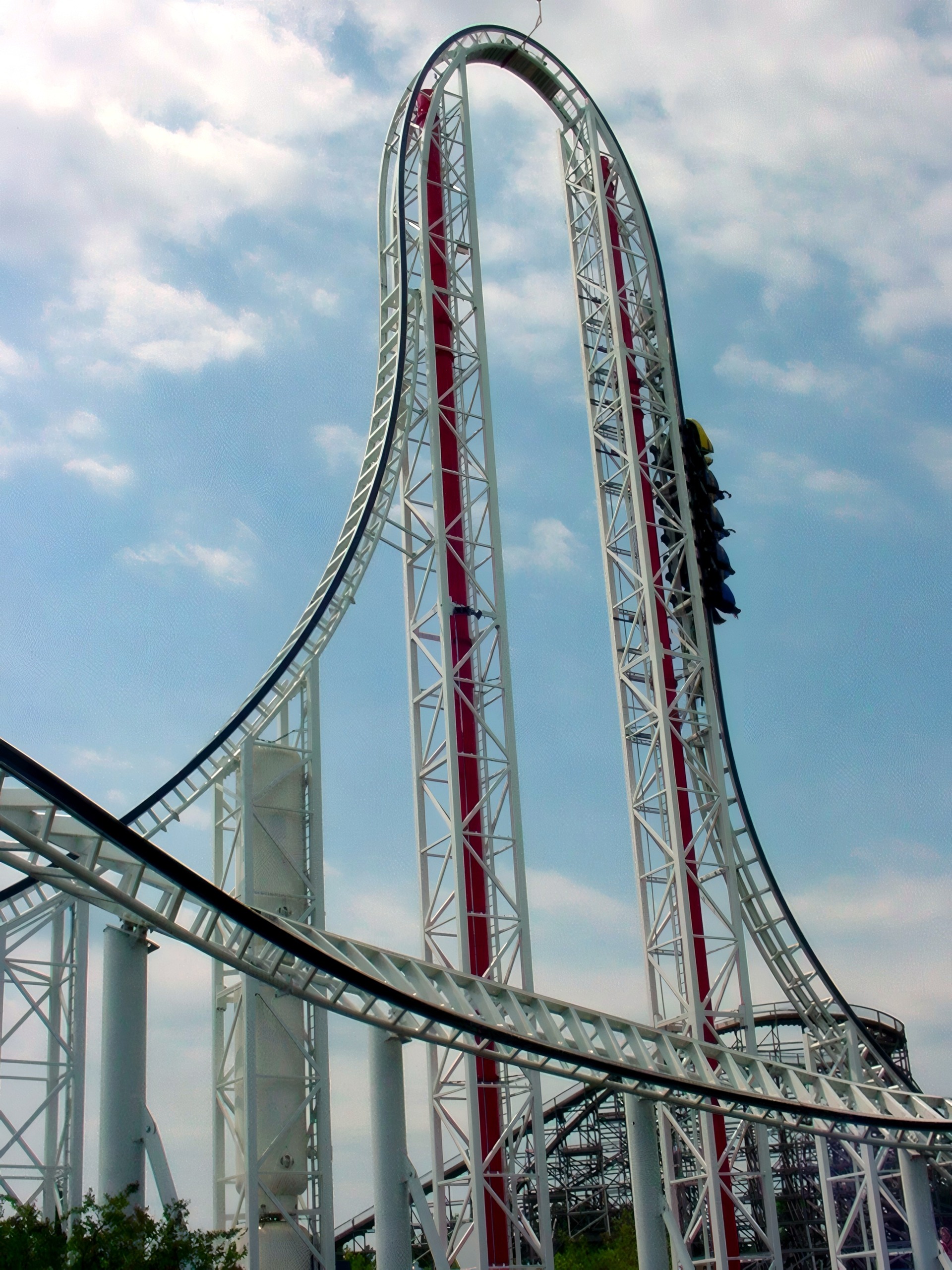 A Hypersonic XLC train climbing the vertical leg of the top hat at Kings Dominion, July 2001