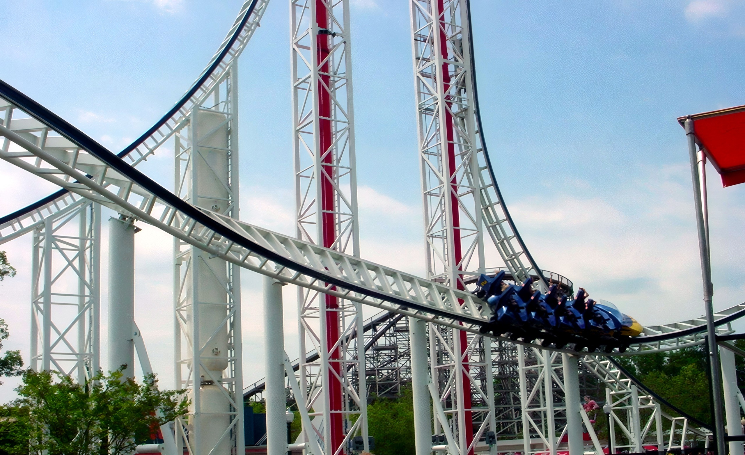 A Hypersonic XLC train on the low track beneath the top hat at Kings Dominion, July 2001
