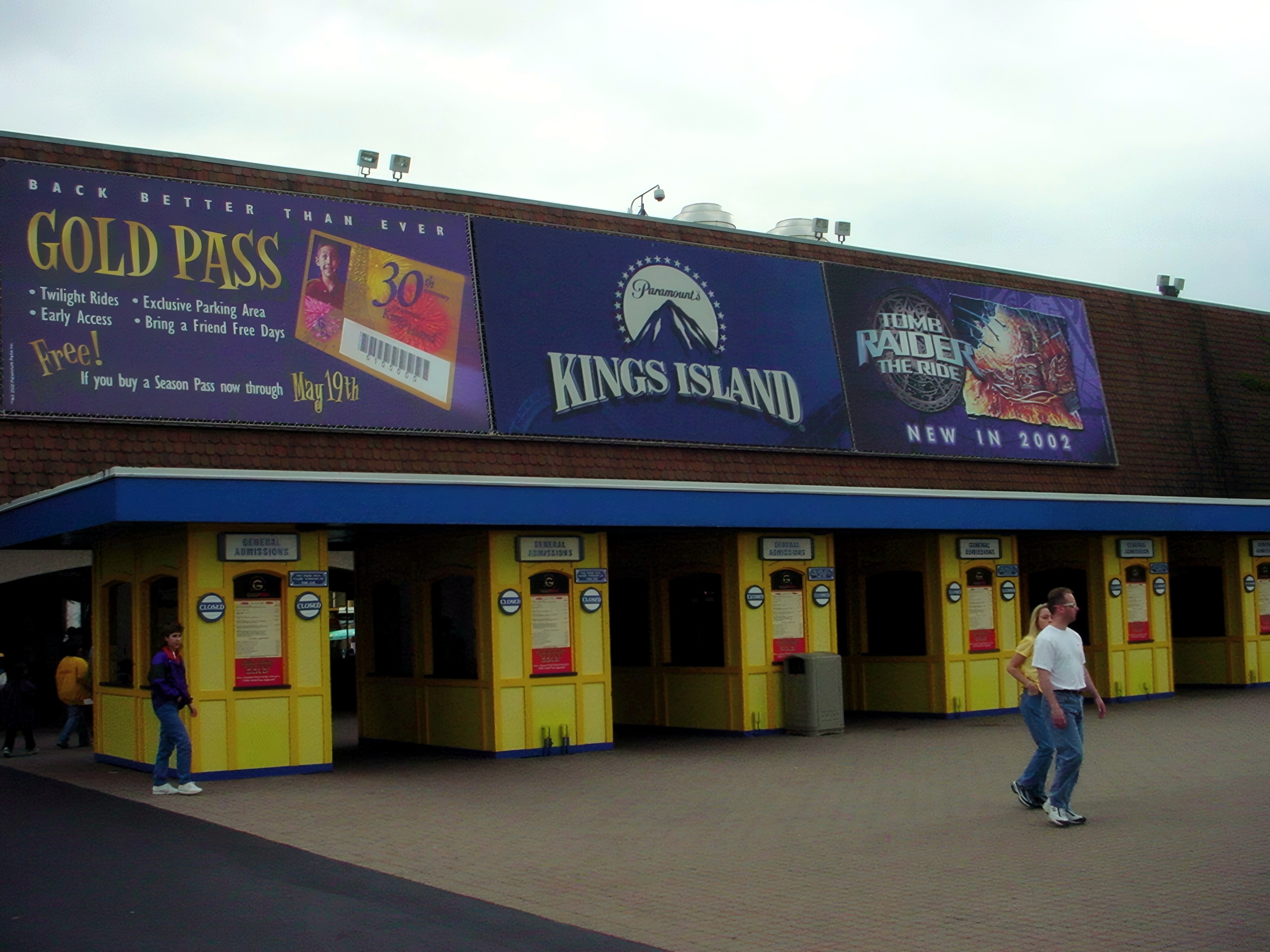The front gate ticket booths under the Gold Pass banners at Paramount's Kings Island, April 2002
