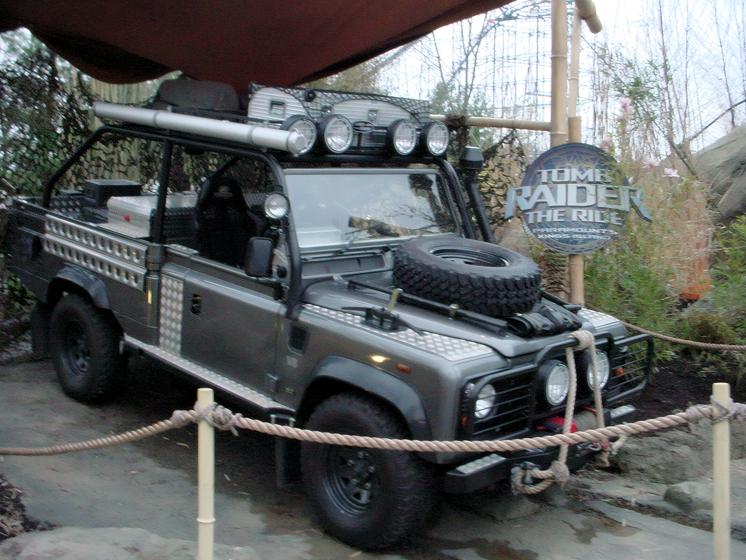 The Tomb Raider Land Rover prop beside the queue at Paramount's Kings Island, April 2002