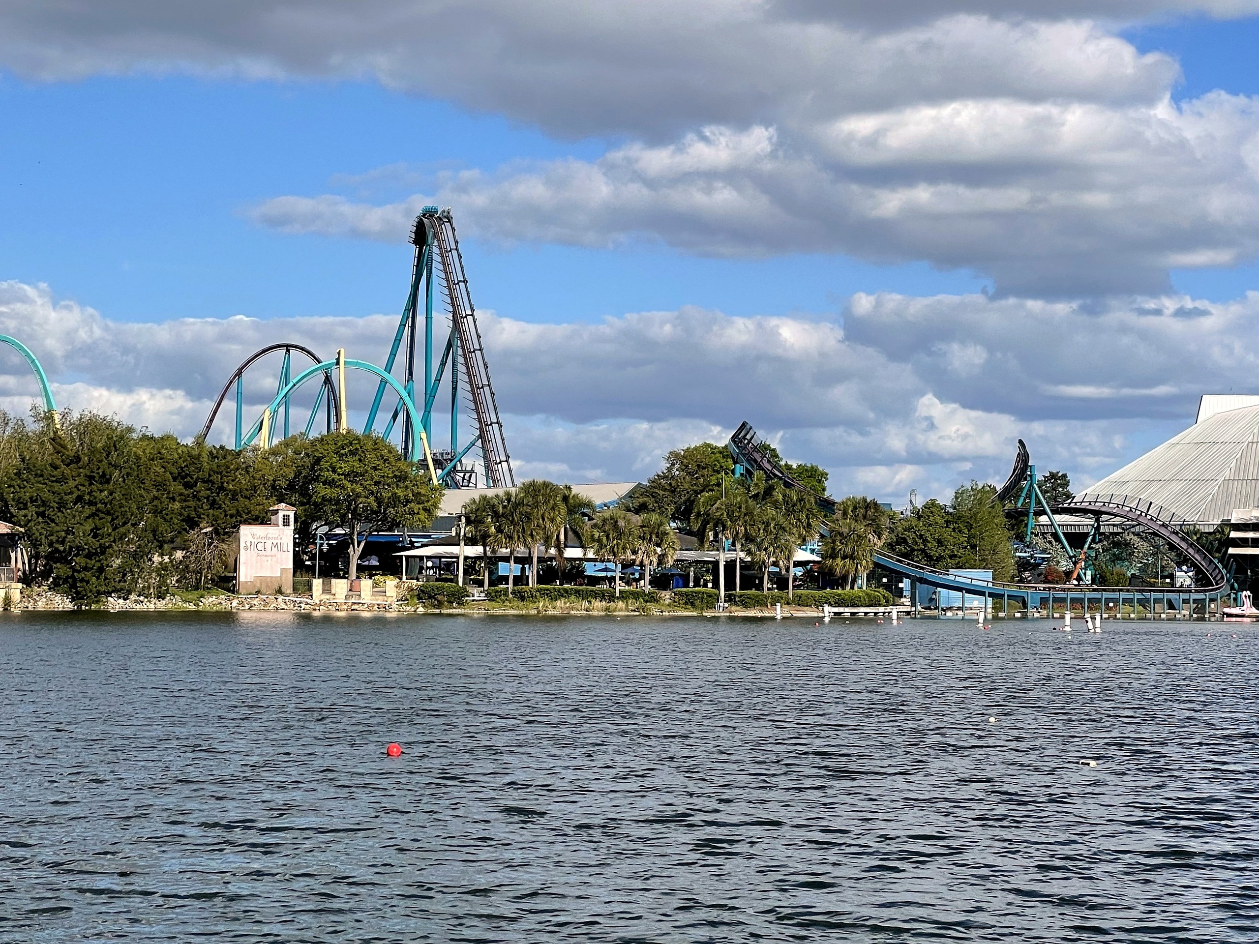 Mako's lift hill and lakeside track across the lake beside the arena at SeaWorld Orlando, March 2021