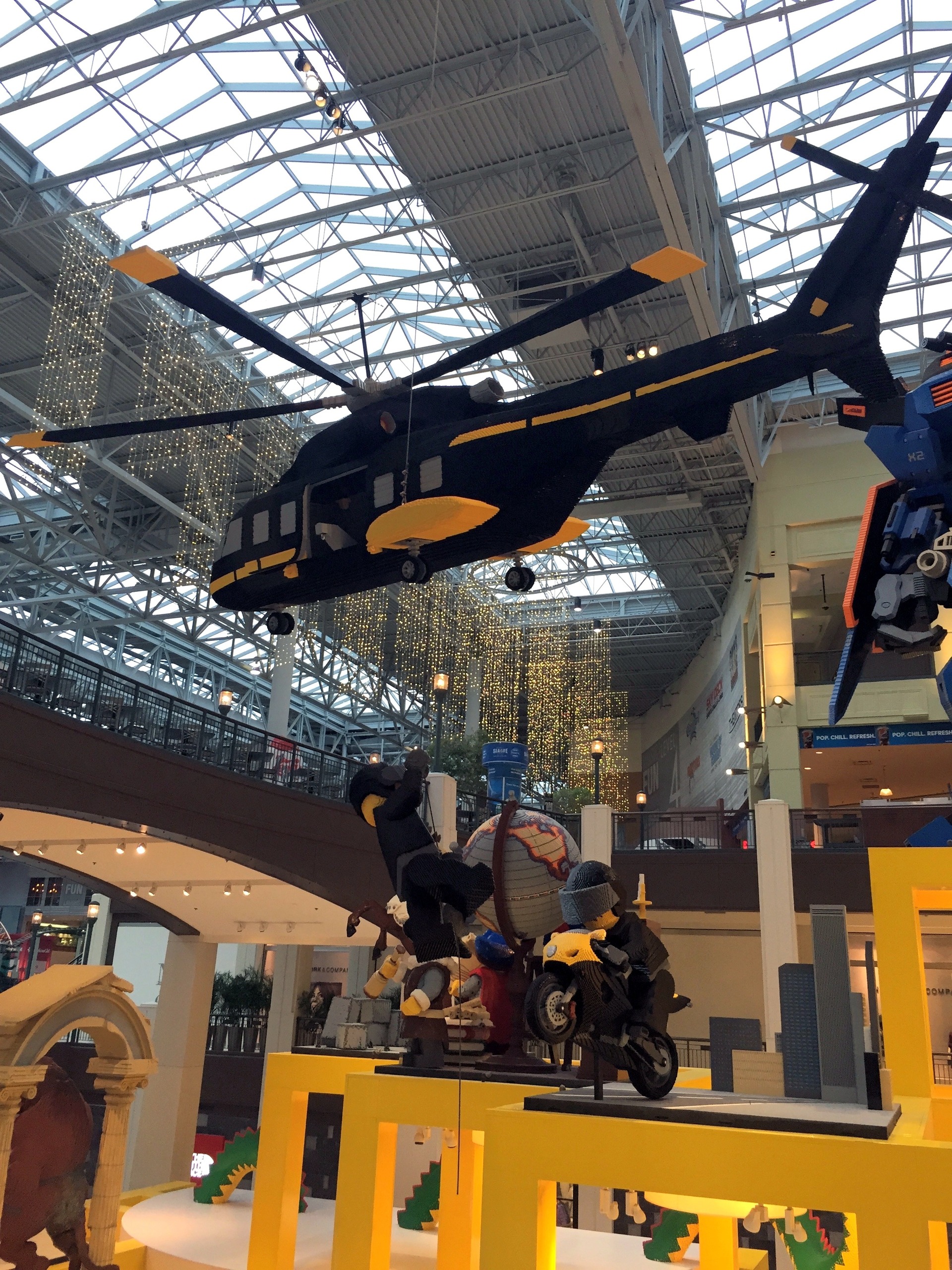 Lego figures and a giant Lego helicopter above the Lego store at Mall of America, November 2015