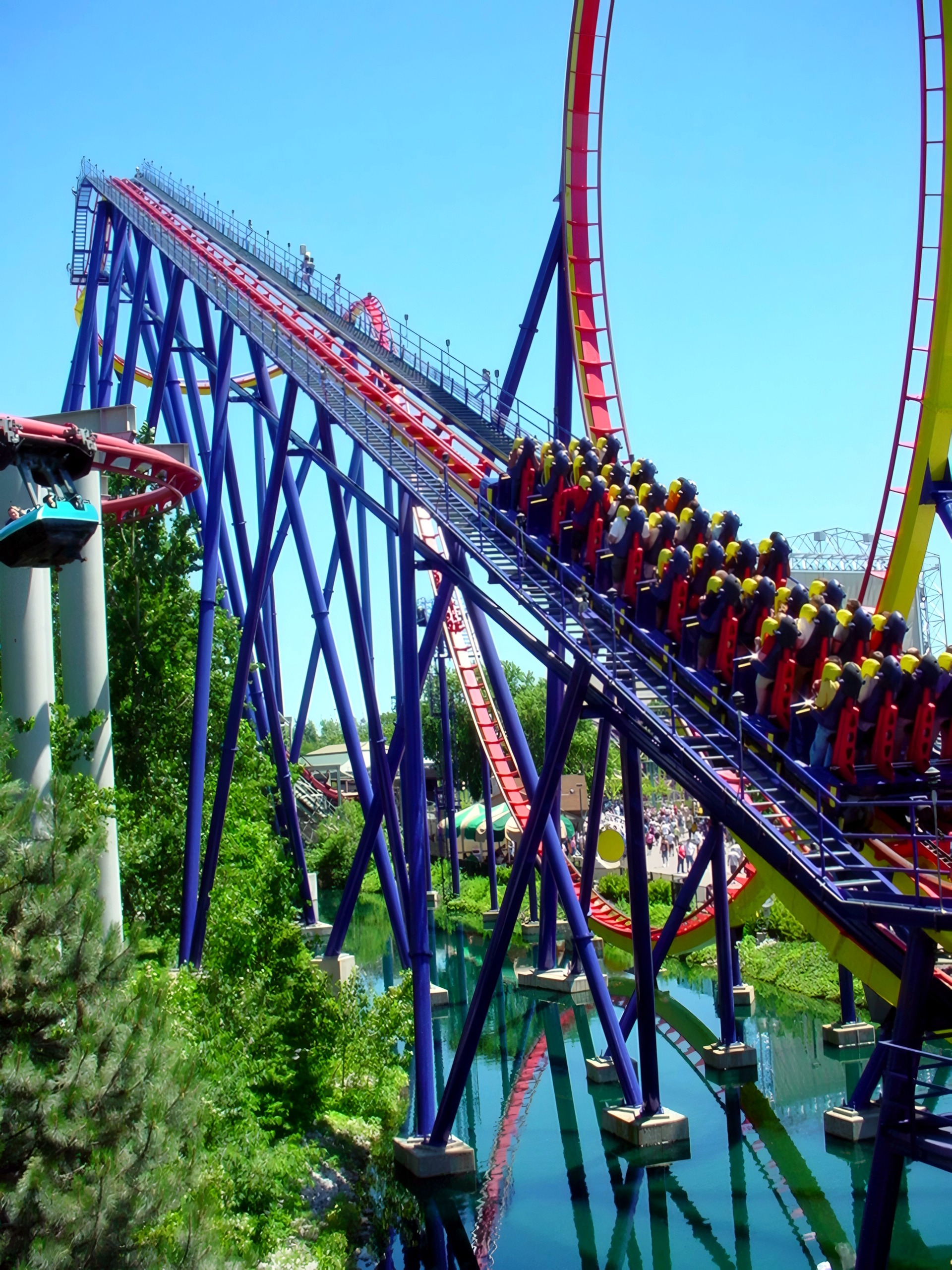 Mantis train climbing the lift over the lagoon, Mantis at Cedar Point